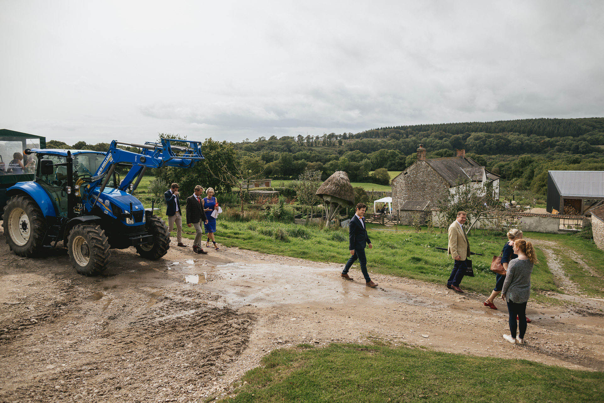 Wedding guests arrive by tractor to River Cottage