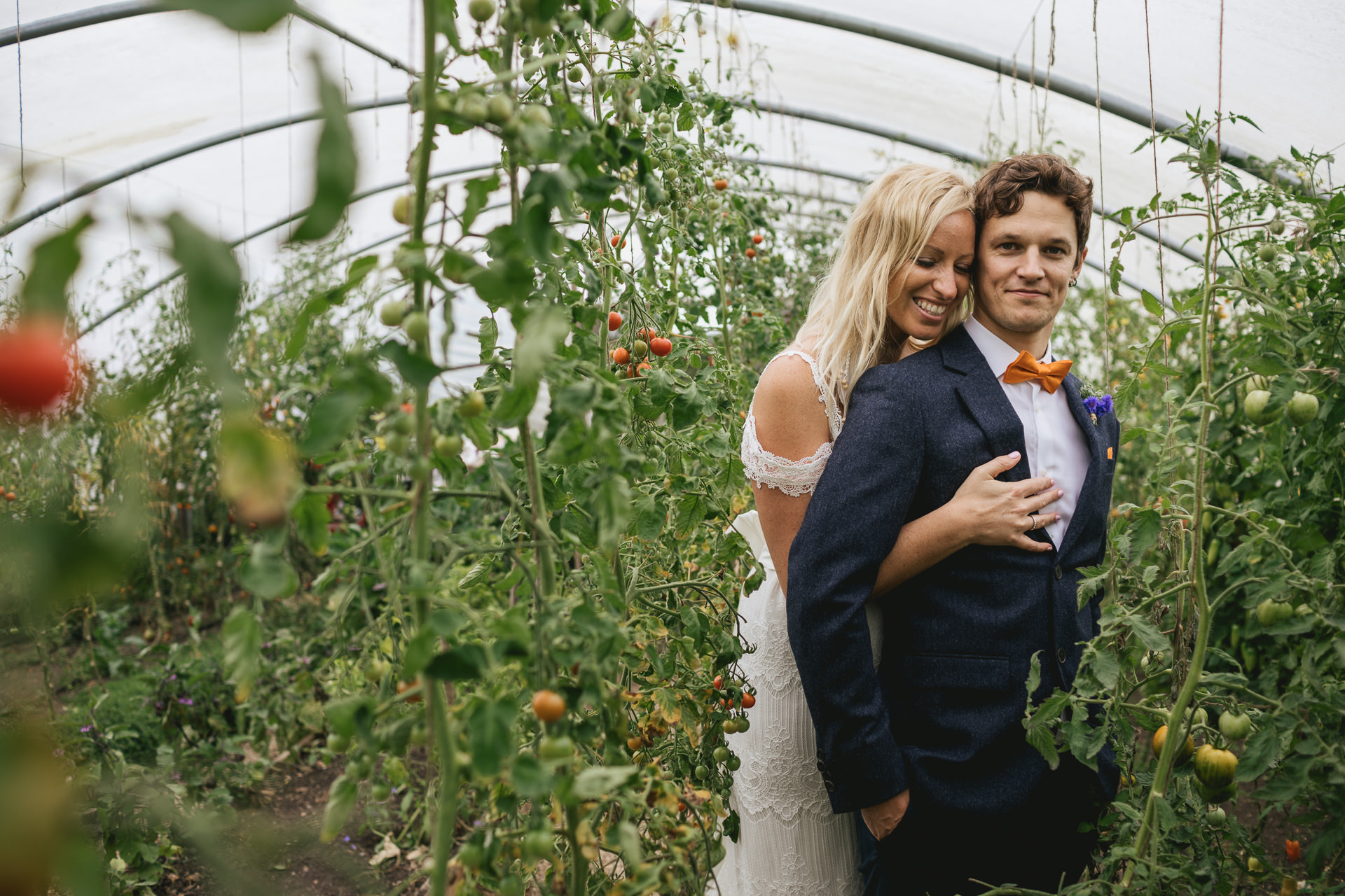 Bride and groom in the polytunnel at River Cottage