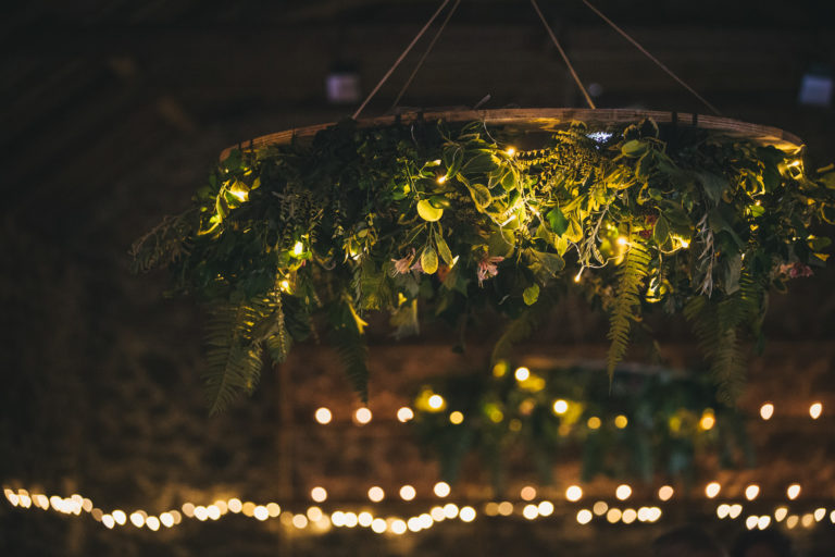 Ceiling garland at Neadon Barn, decorated with candles