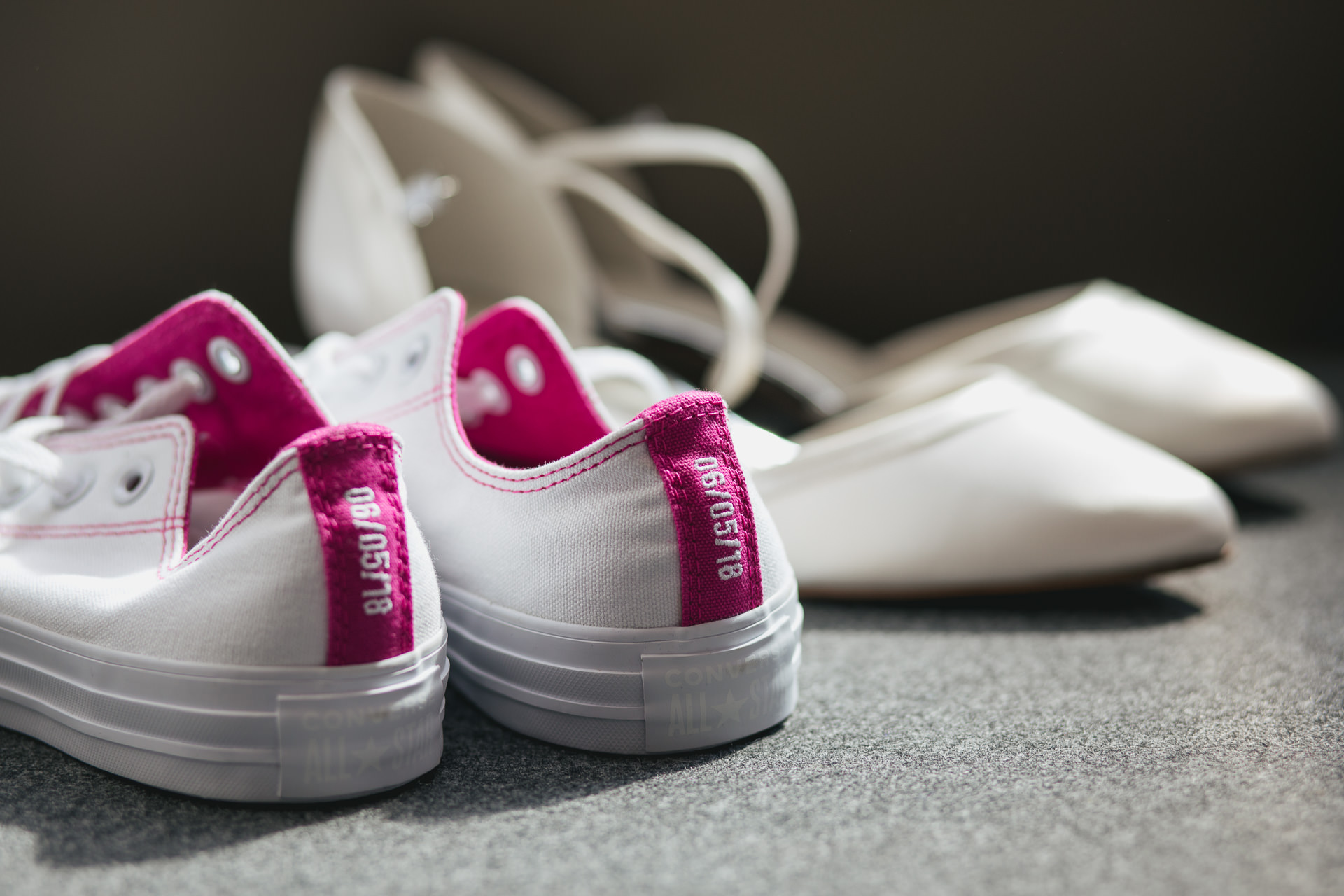 Bride's converse trainers with wedding date embroidered