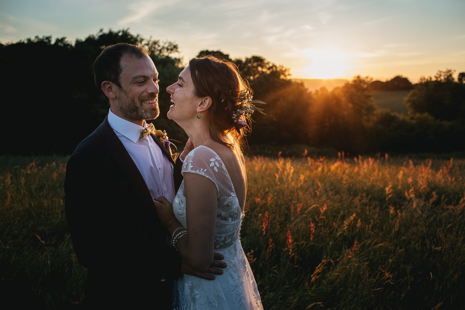 Bride and groom with a sunset 