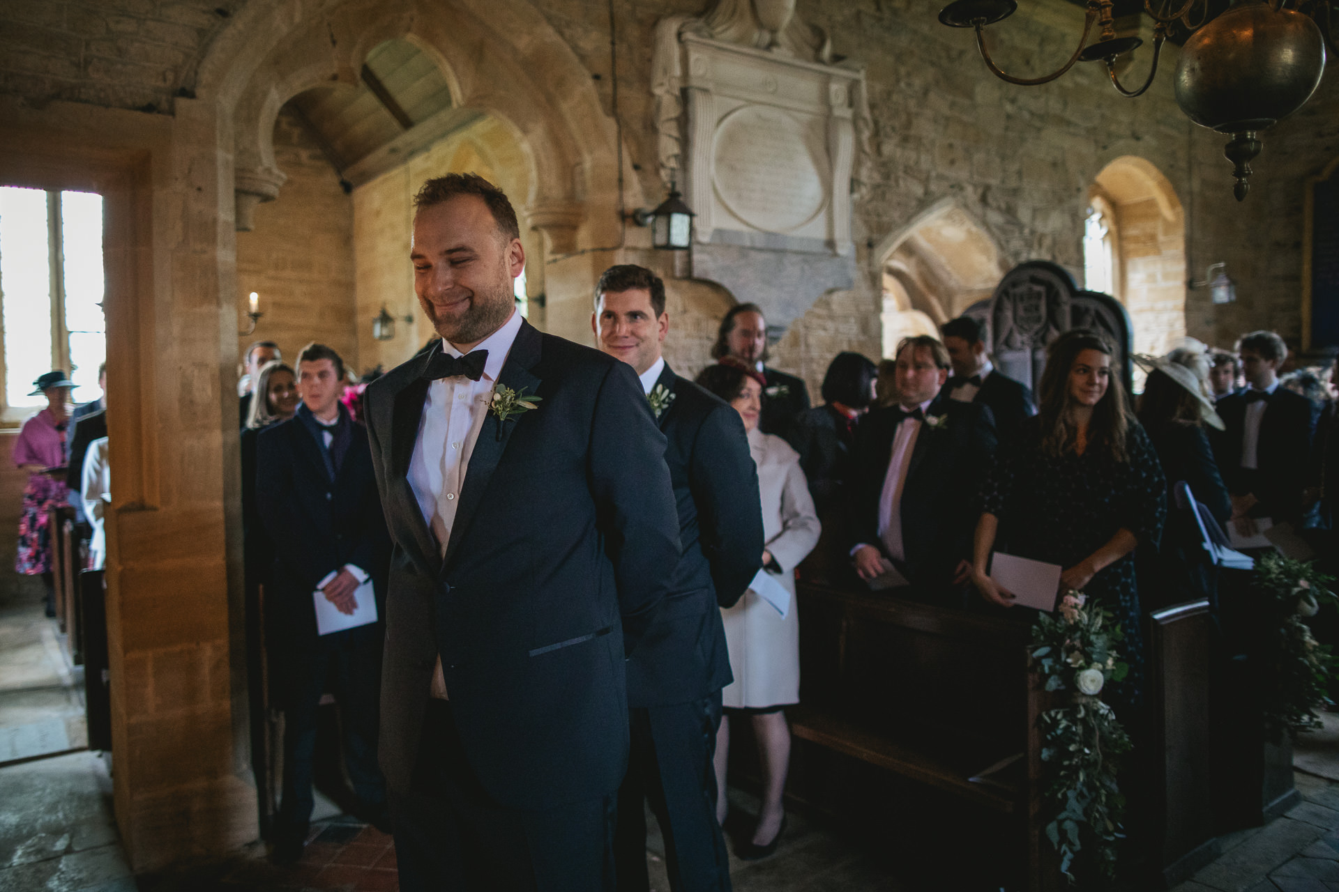 Groom waiting at the front of the church