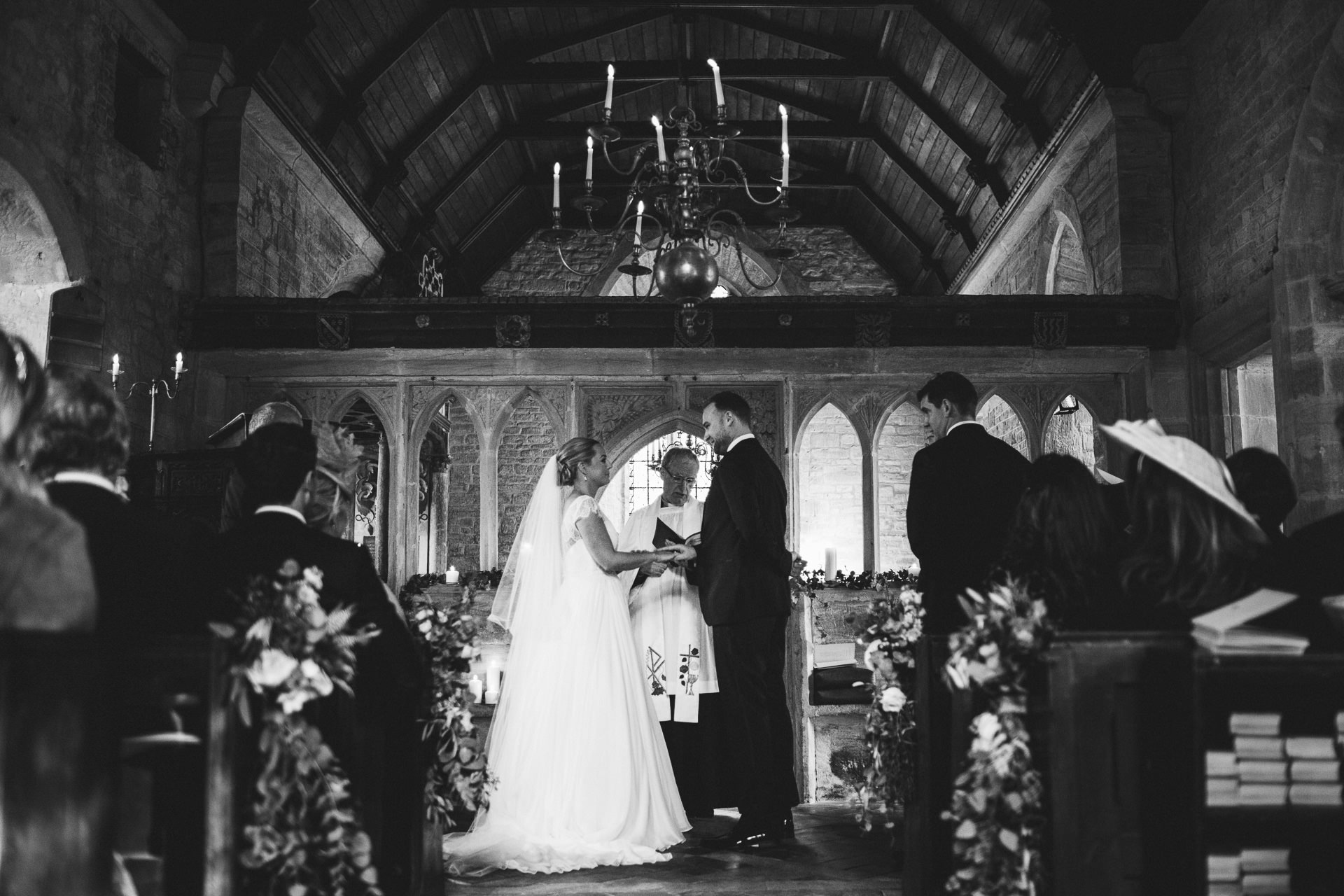 Bride and groom facing each other in the church