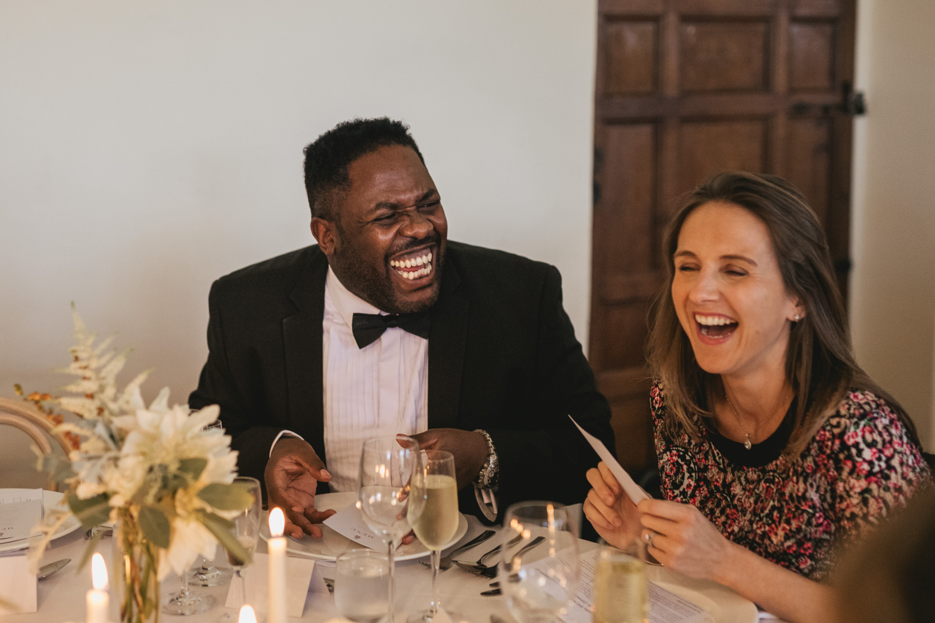 Wedding guests smiling at lobster adoption favours