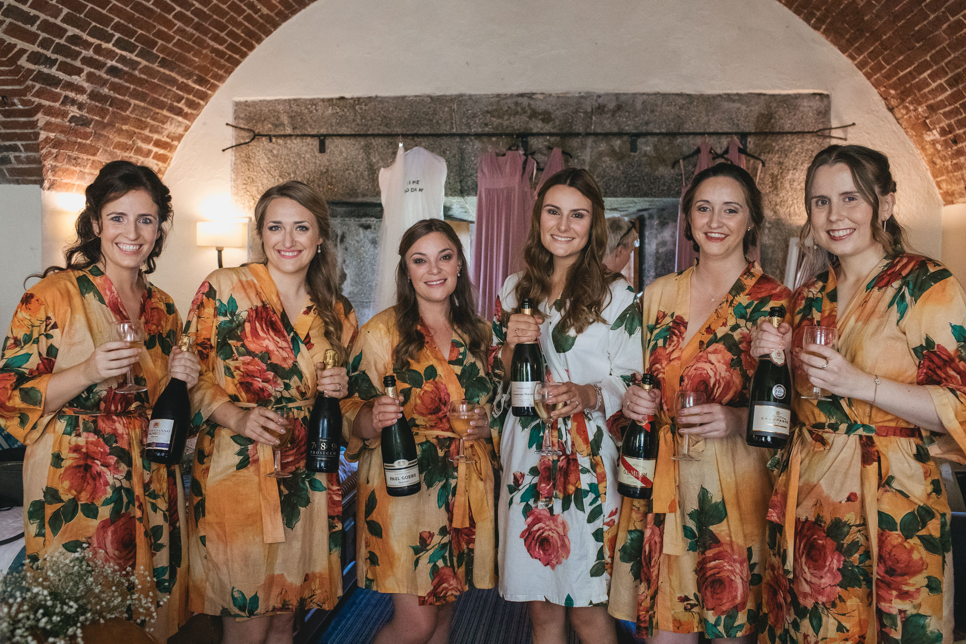 Bride and bridesmaids with champagne