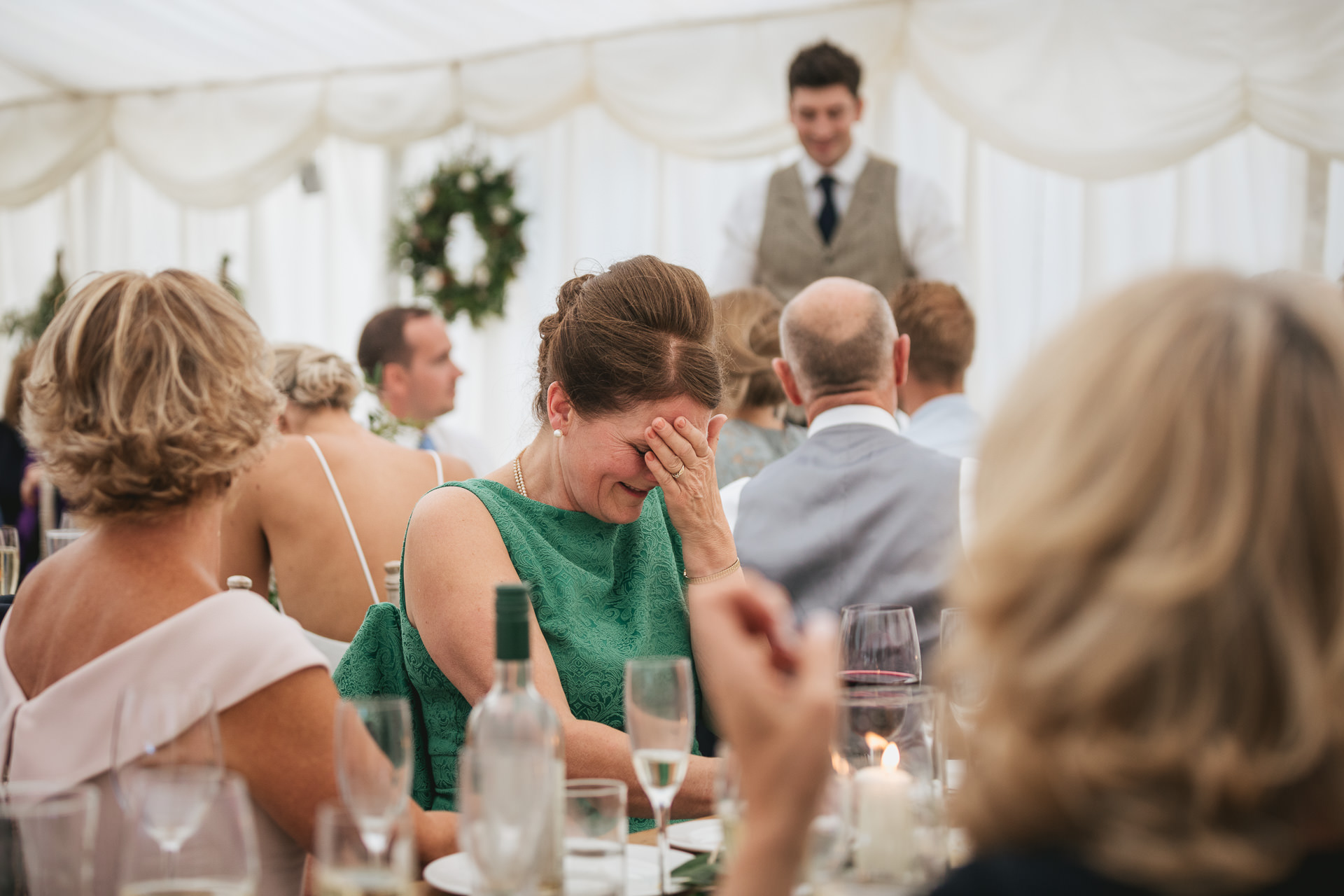 Wedding speeches inside a marquee