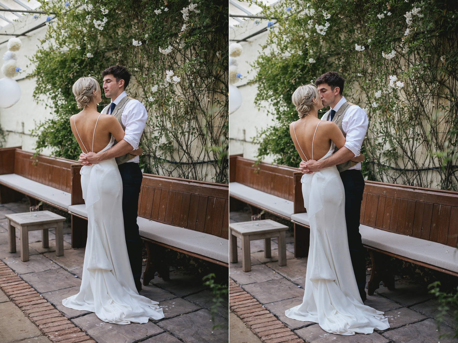 Groom holding bride with backless dress