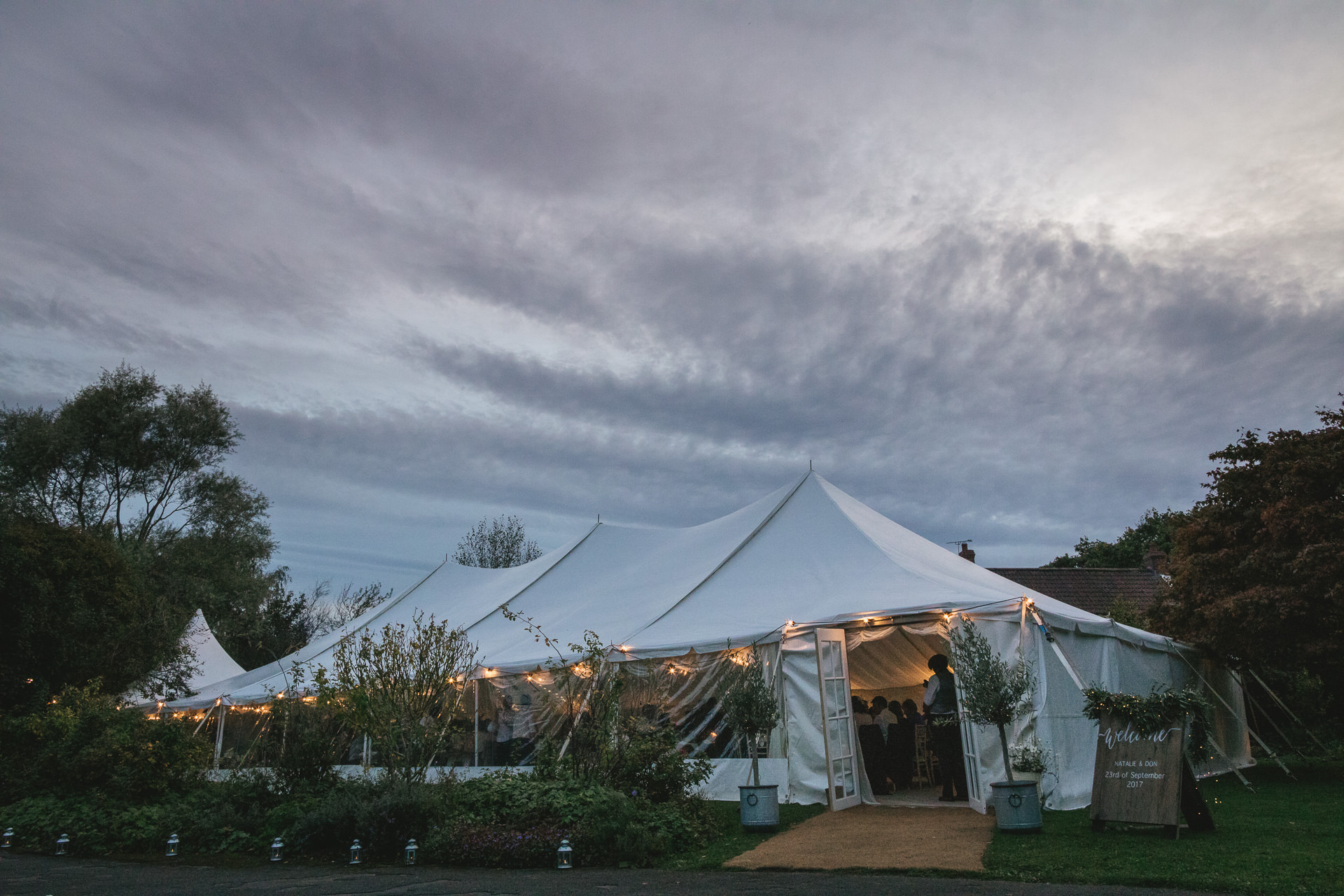 Marquee with pretty lights at dusk