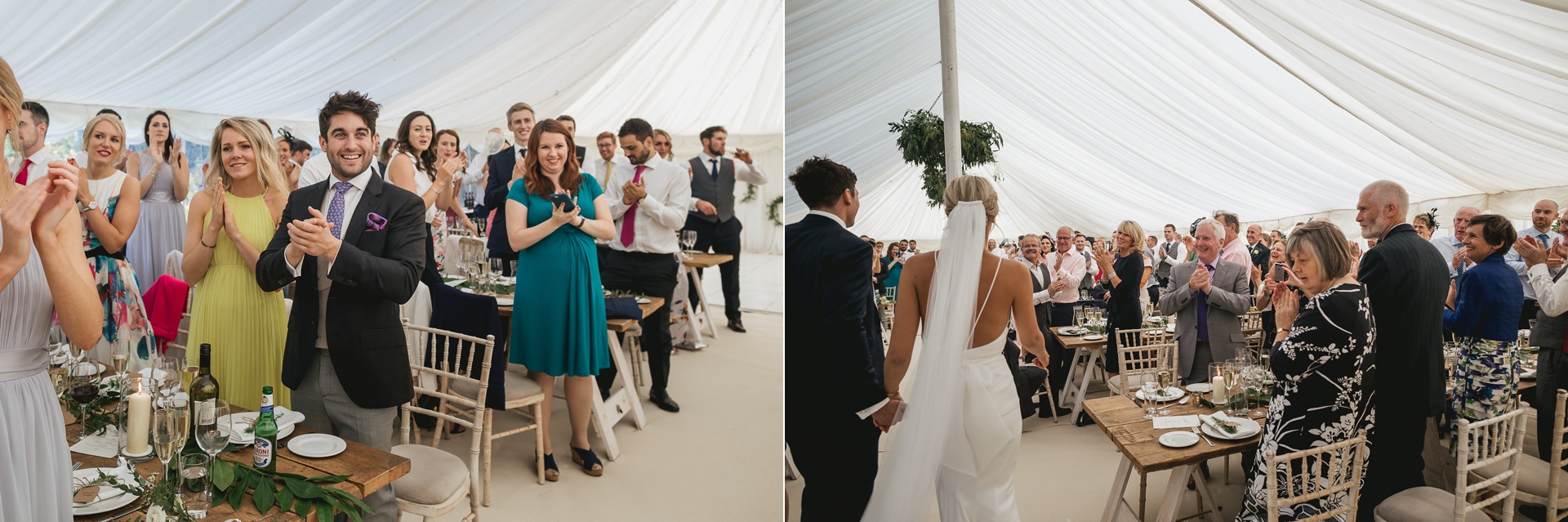 Guests cheering bride and groom into marquee