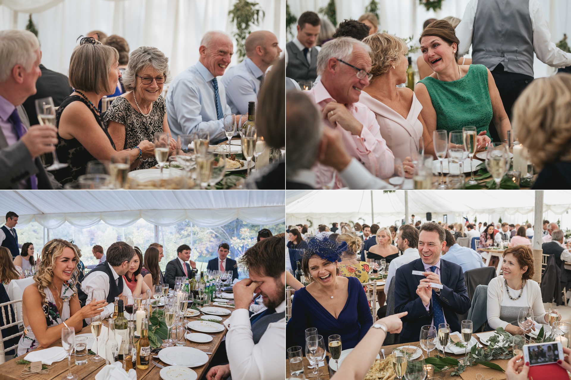 Wedding guests laughing inside a marquee