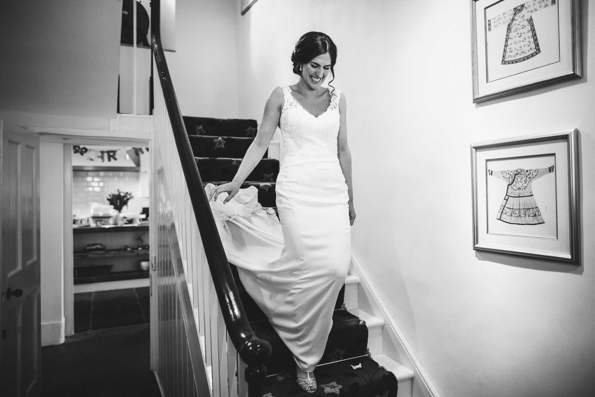 Bride walking down a staircase