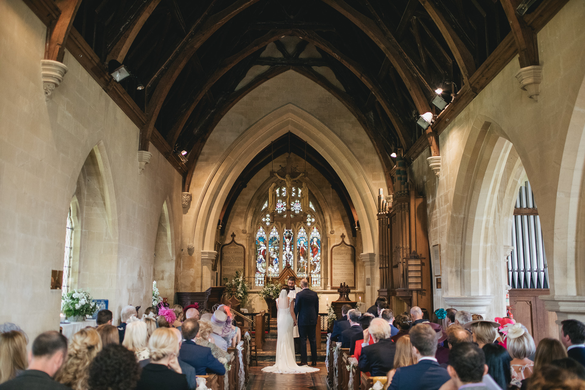 Bride and groom in church at Landscove, Devon