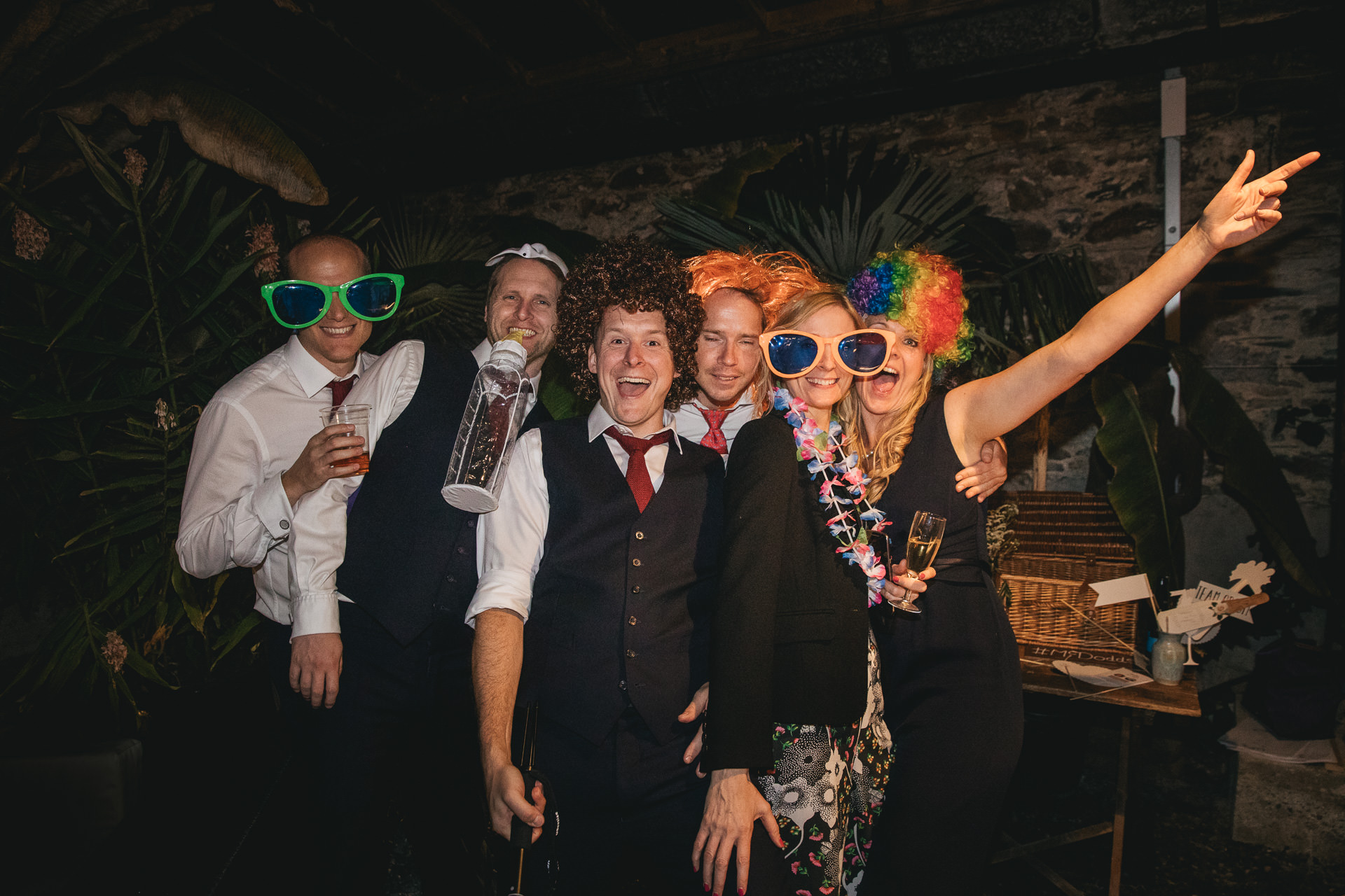 Wedding guests dressed in silly props