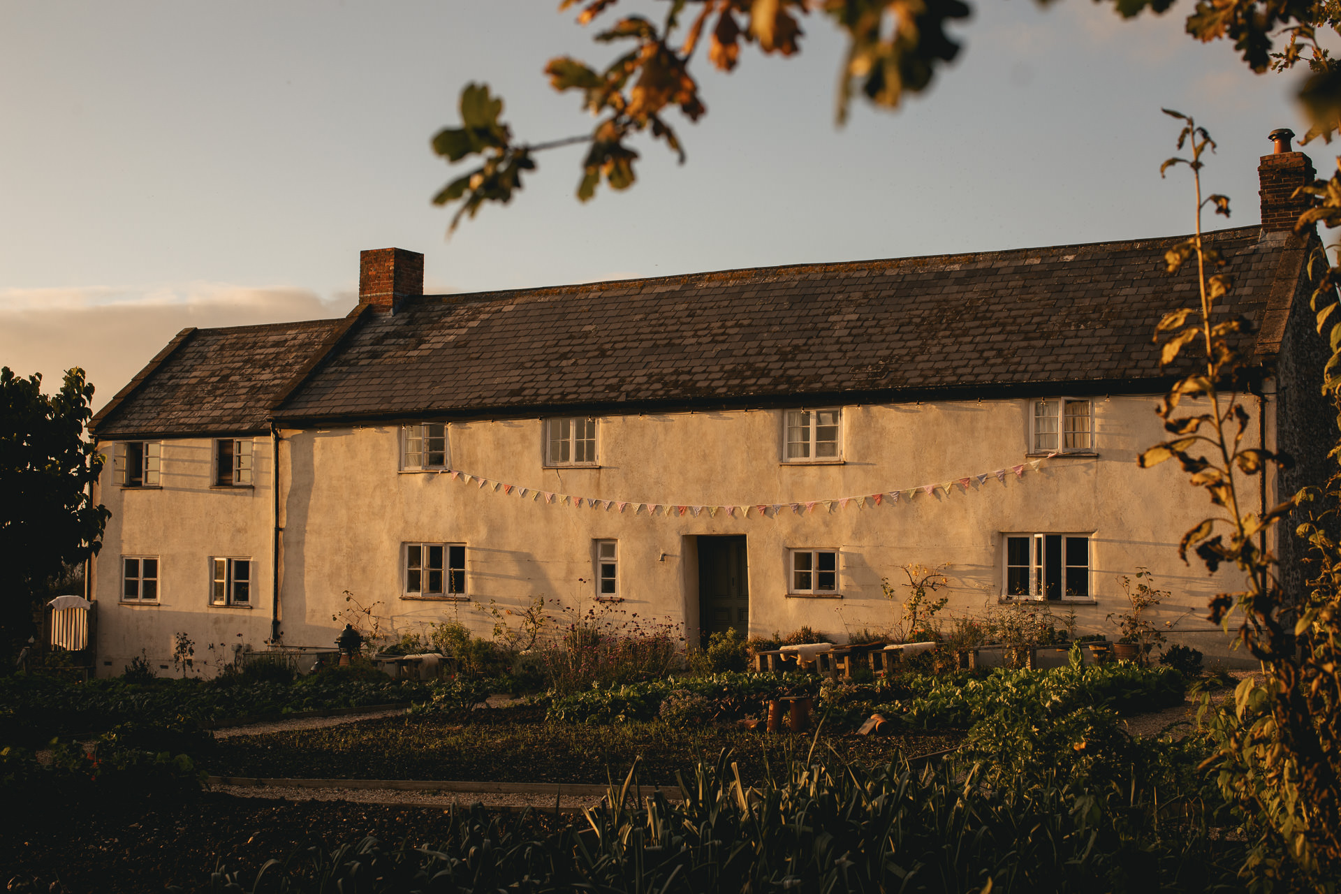 River Cottage in evening sunlight
