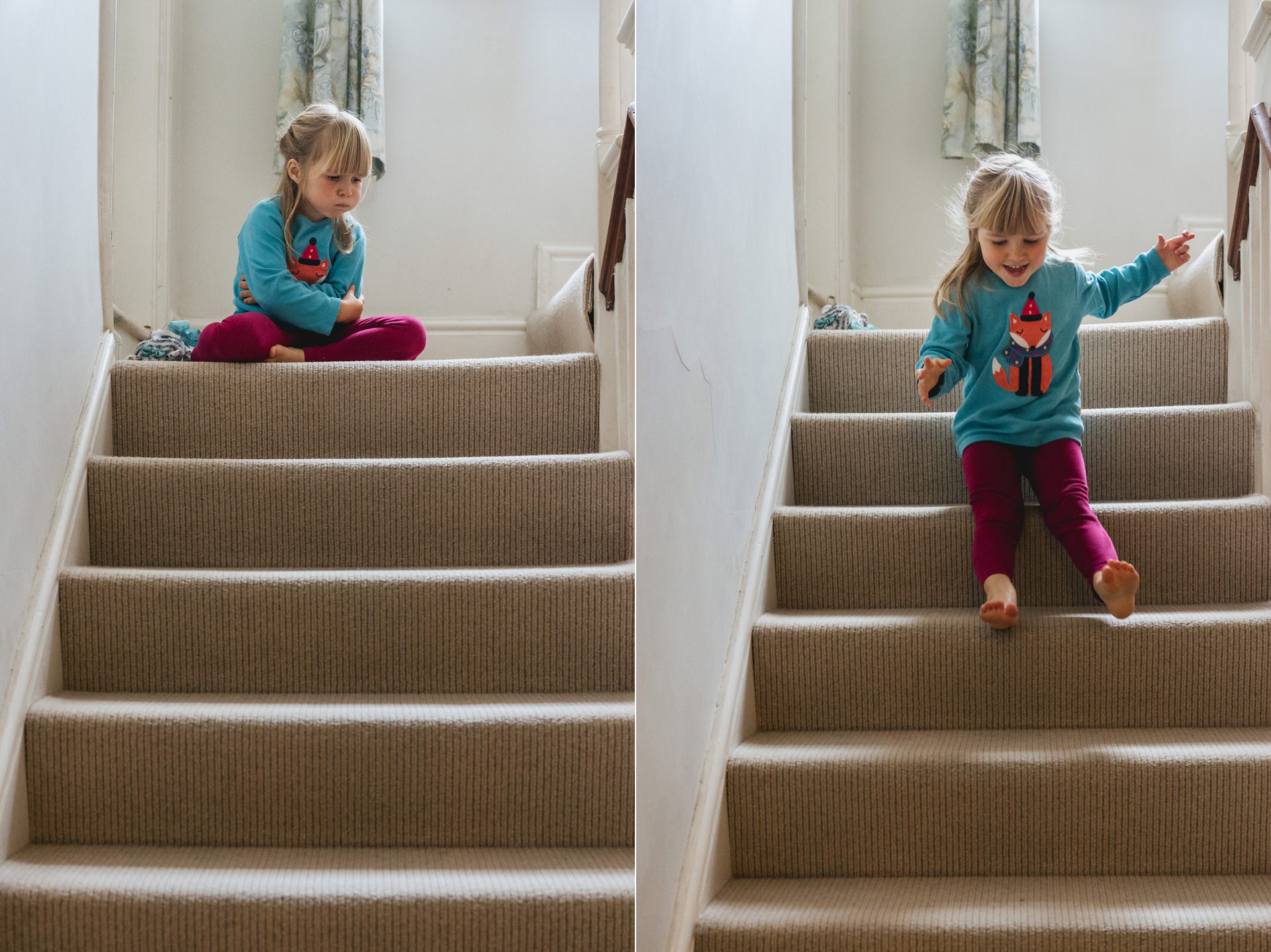 A young girl bouncing down a staircase at home