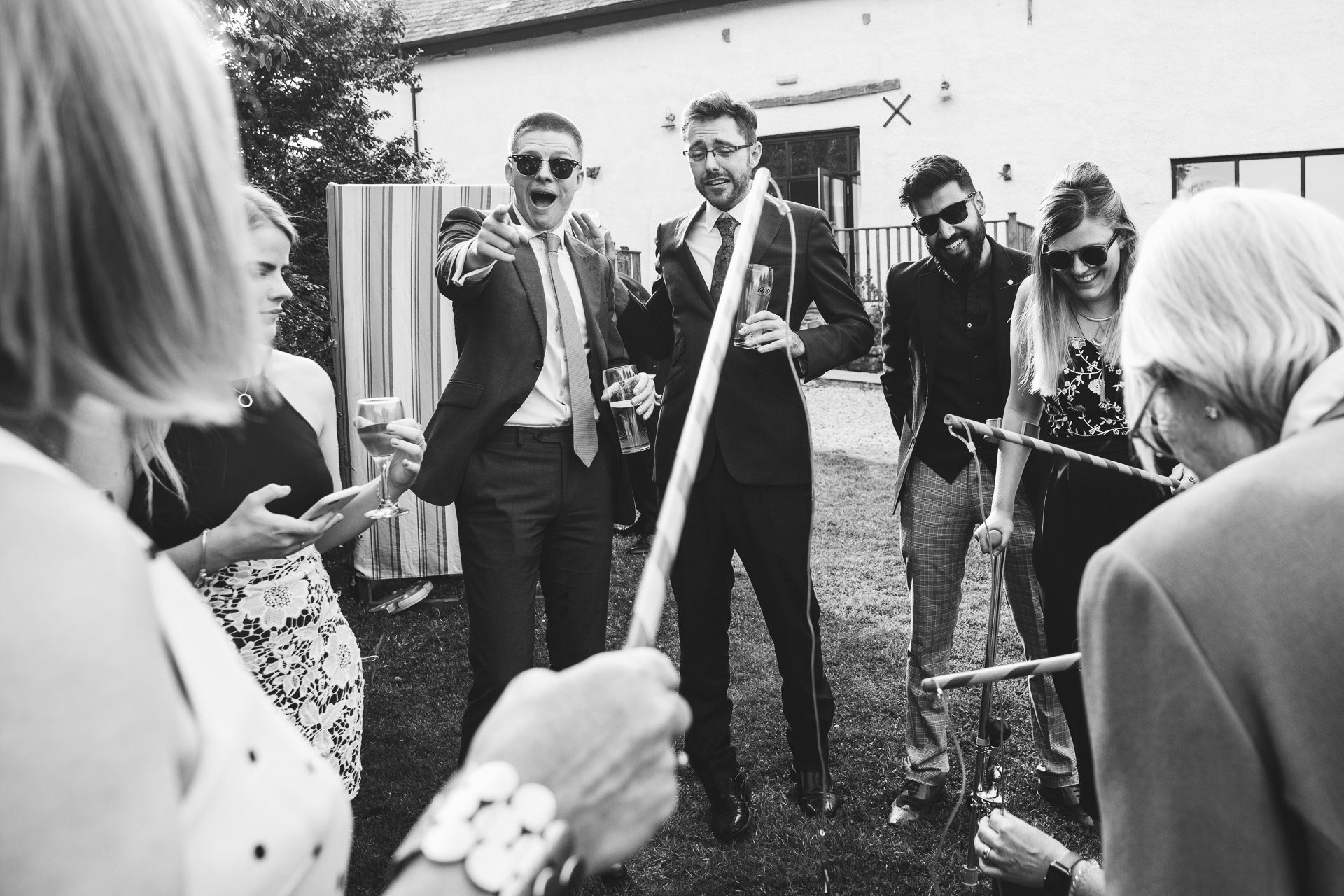 Wedding guests playing village fete games