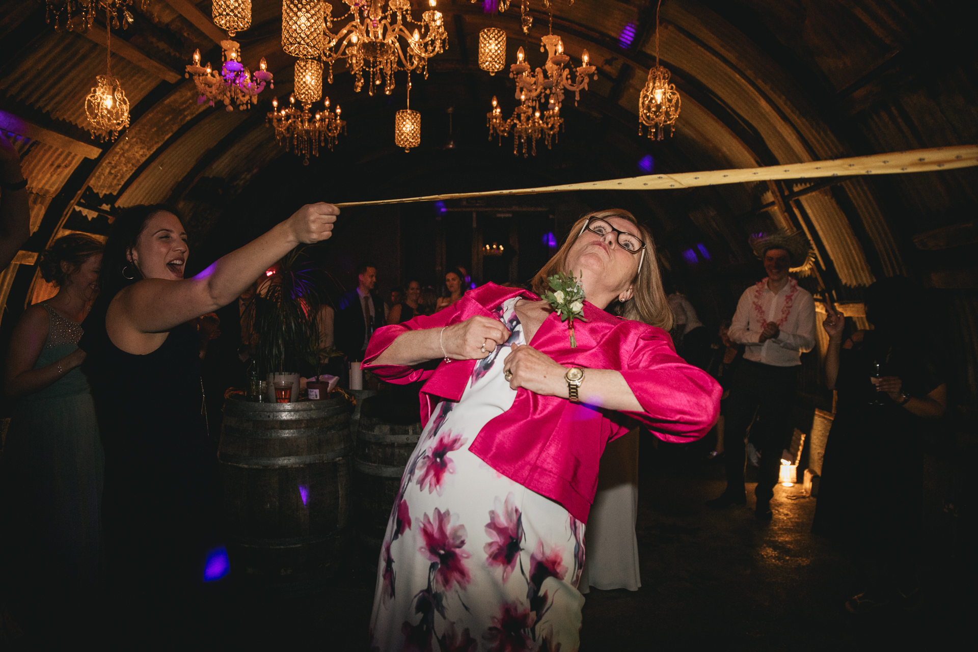 Mother of the bride doing limbo