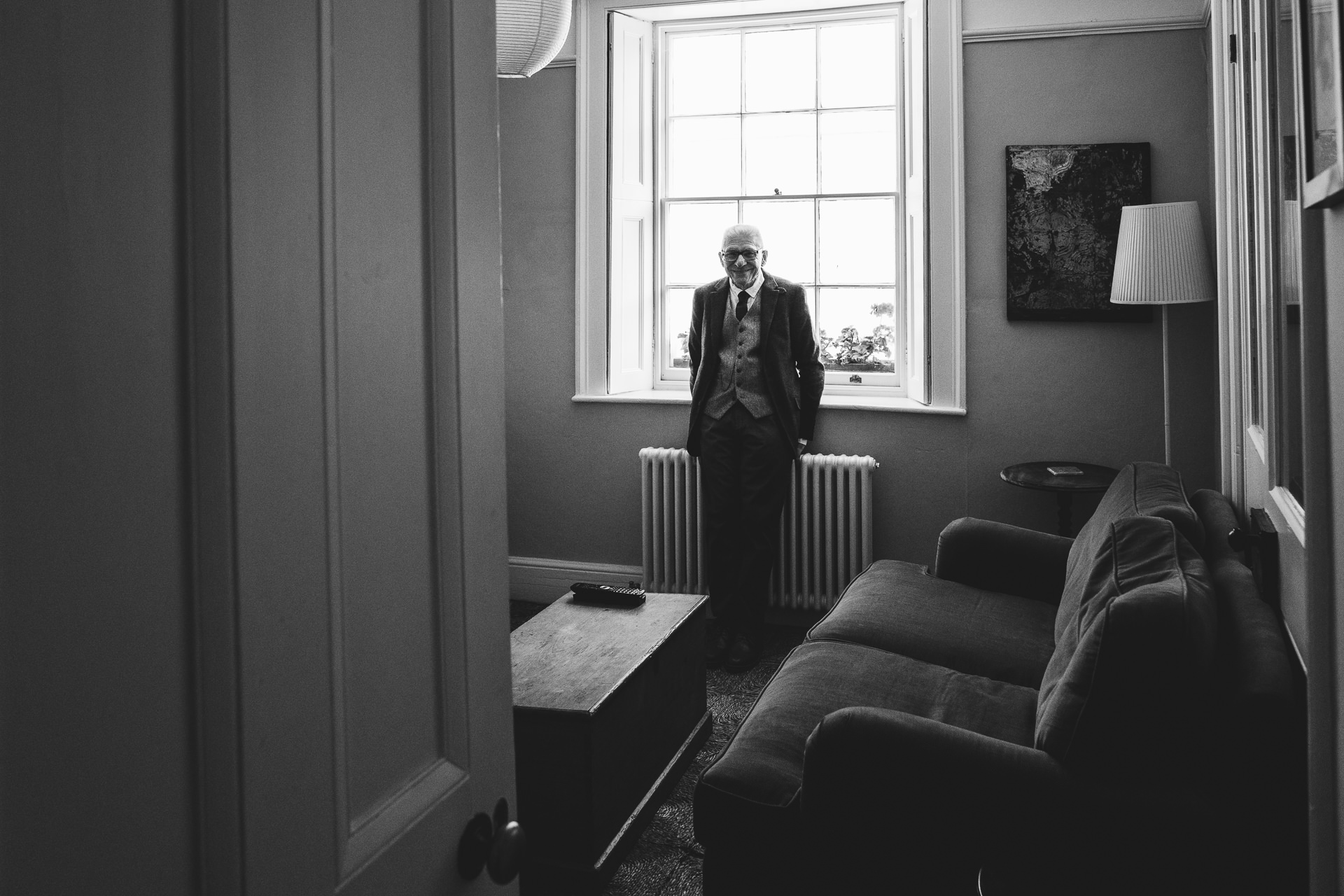 A man waiting alone in a room
