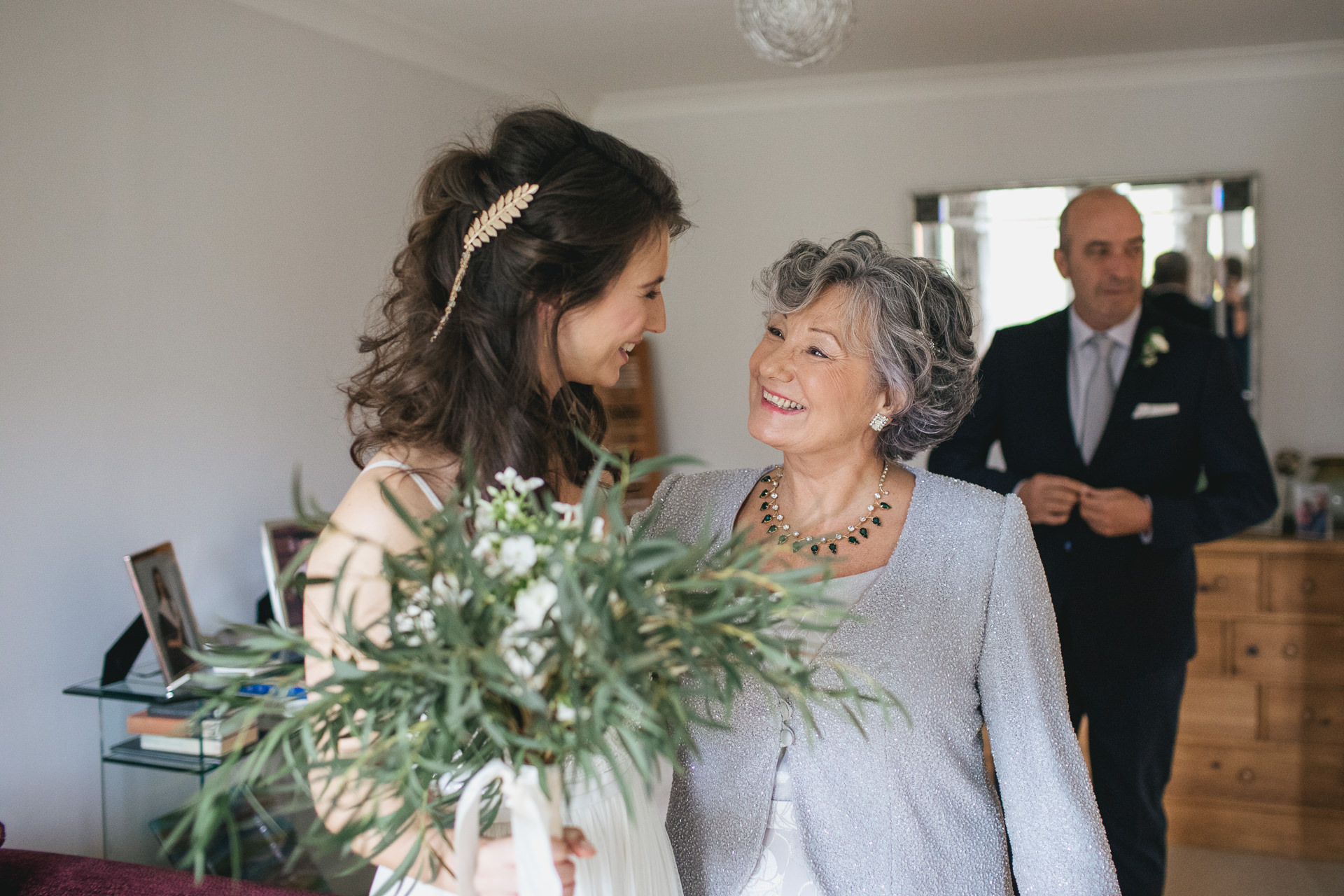 Mother of the bride smiling at her daughter