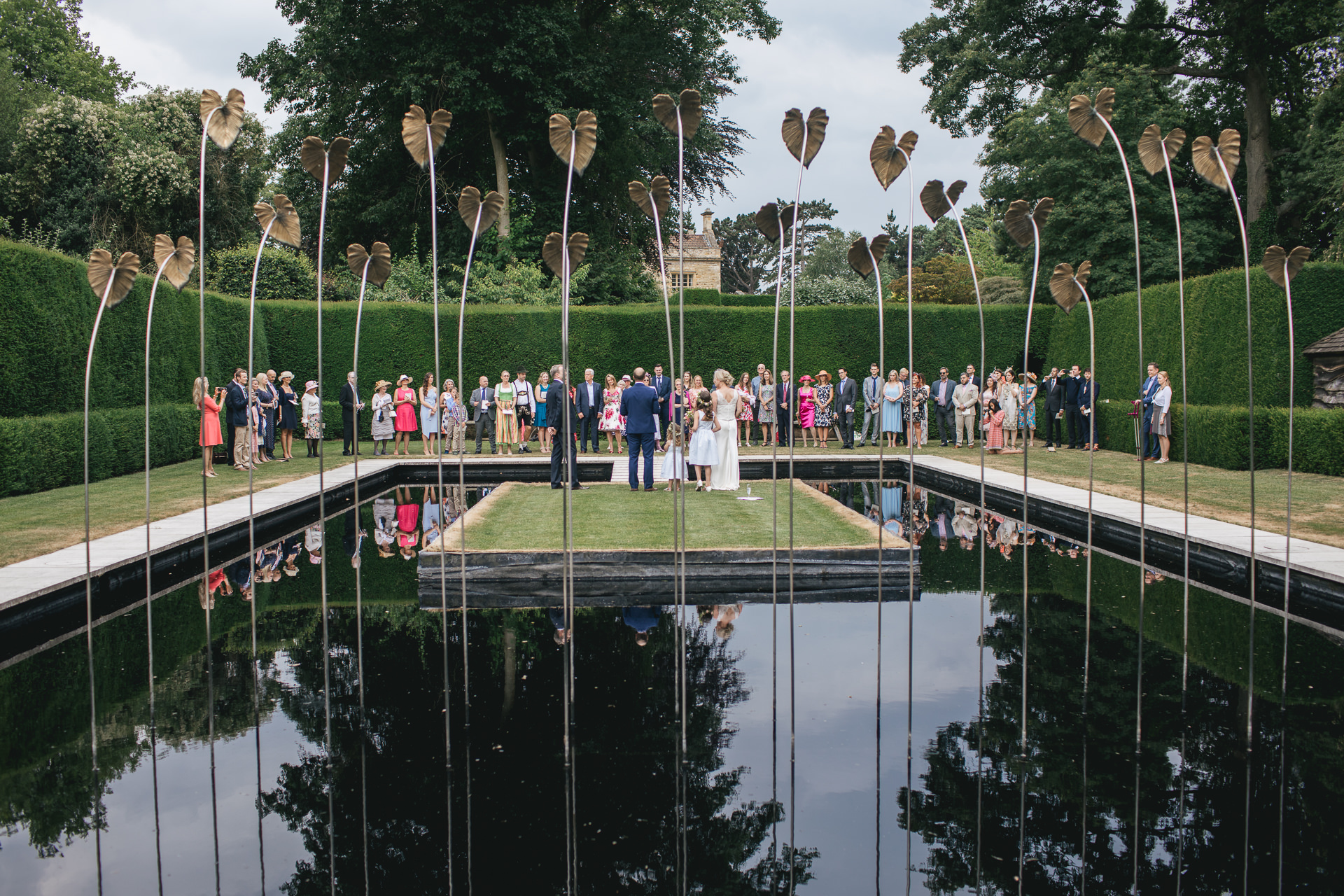 A wedding ceremony in an ornamental pond