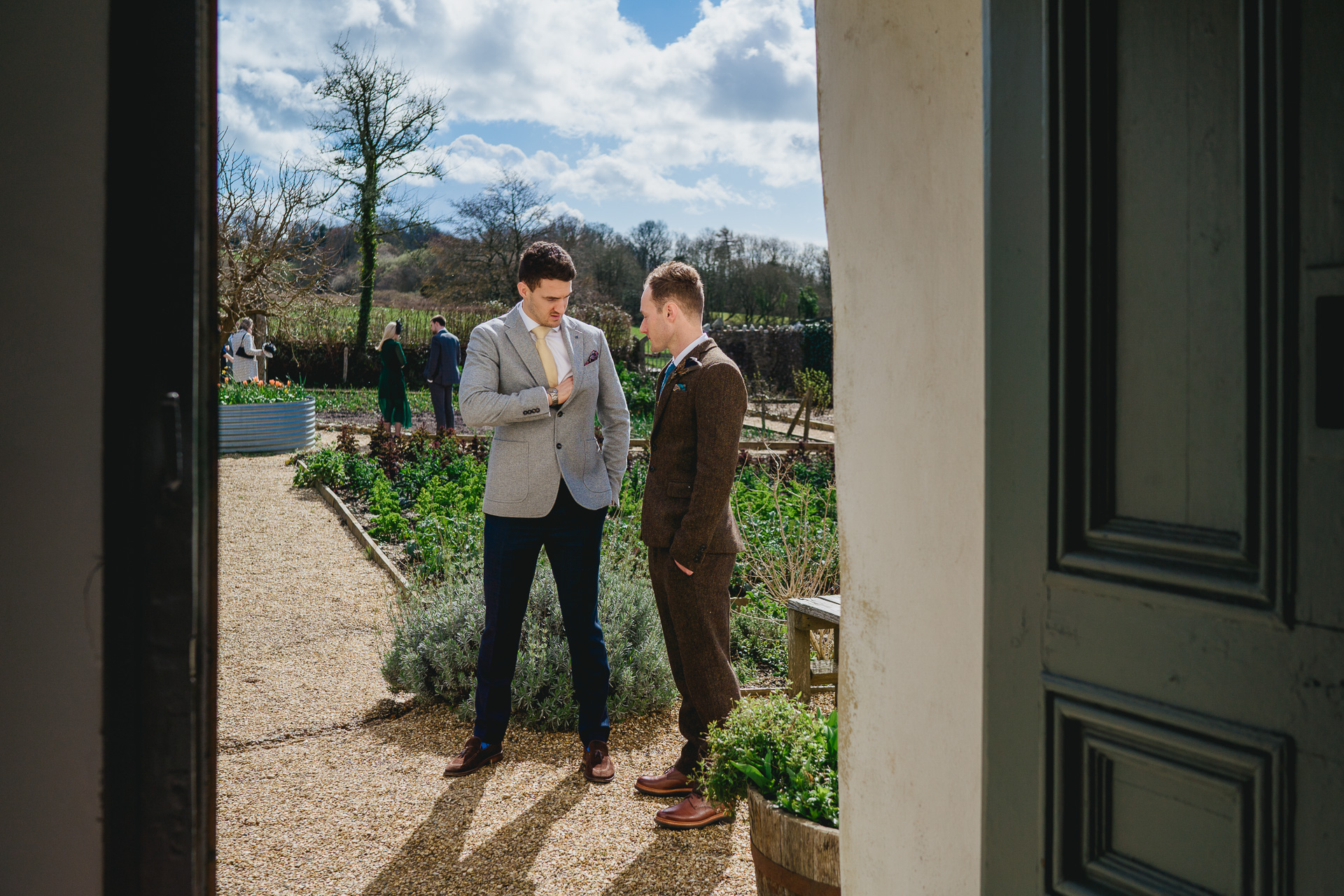 Groom and best man outside River Cottage