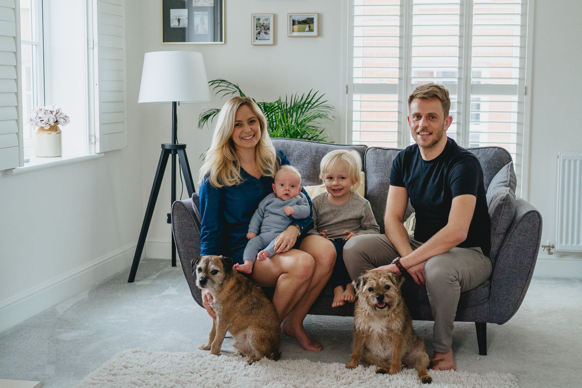 A portrait of a family and their dogs at home in Dorset