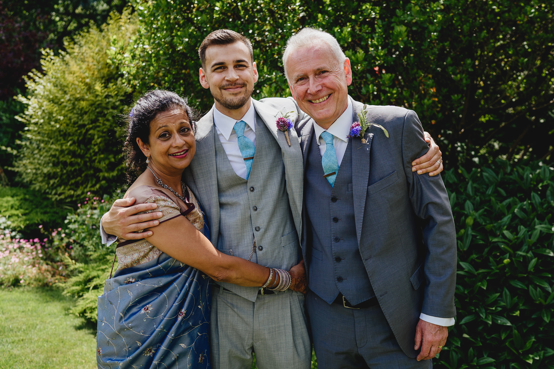 Groom with his mother and father