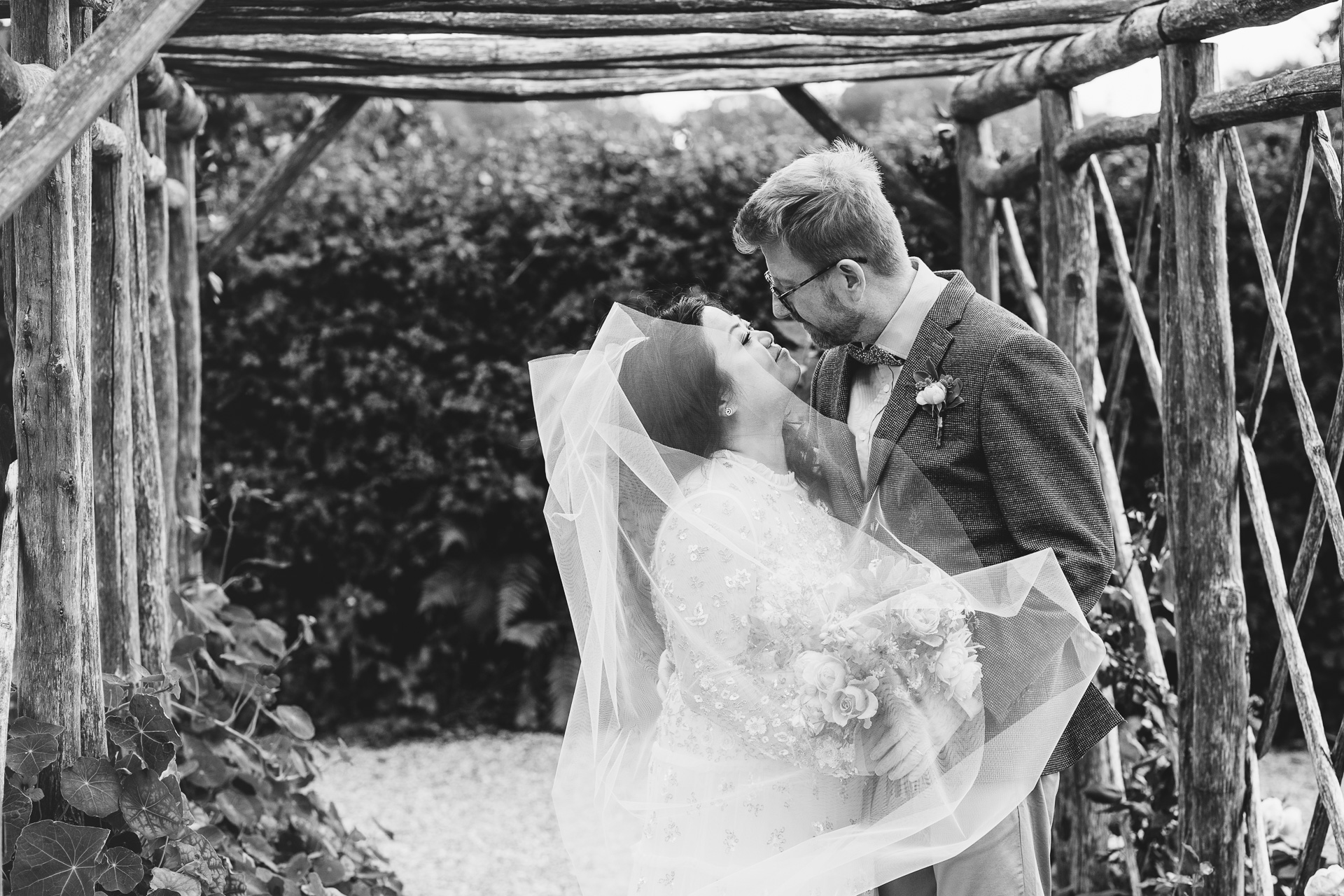 bride and groom portrait outside in a kitchen garden