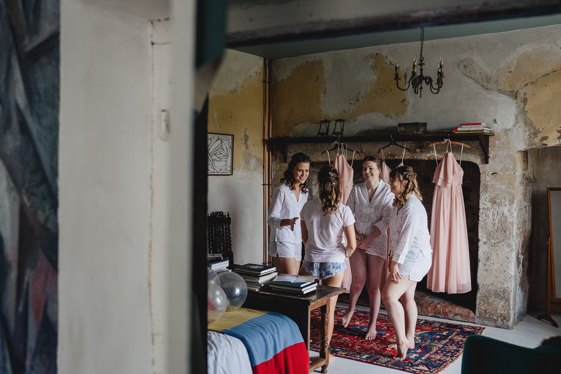 Group of women laughing together in pyjamas