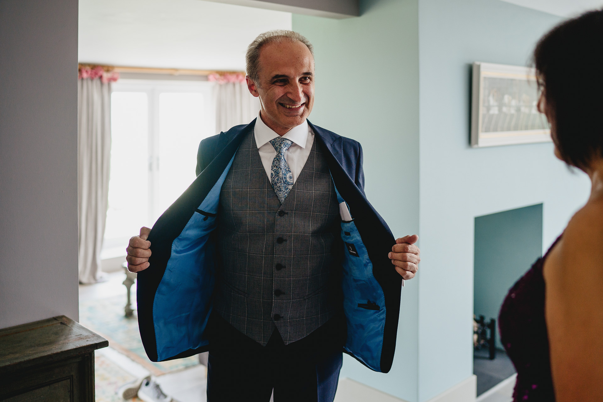 A man showing off his suit