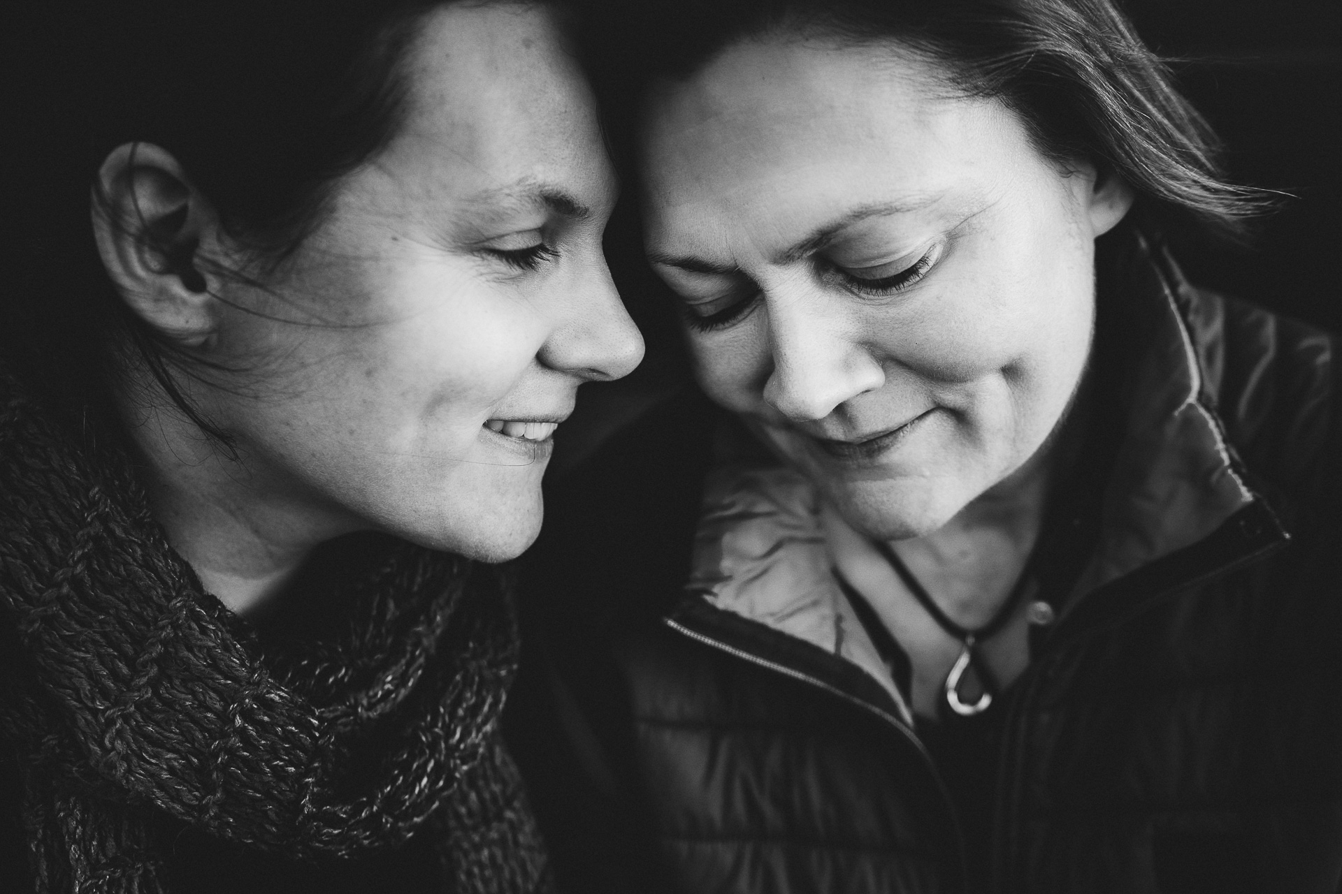 Close up of two women cuddling together