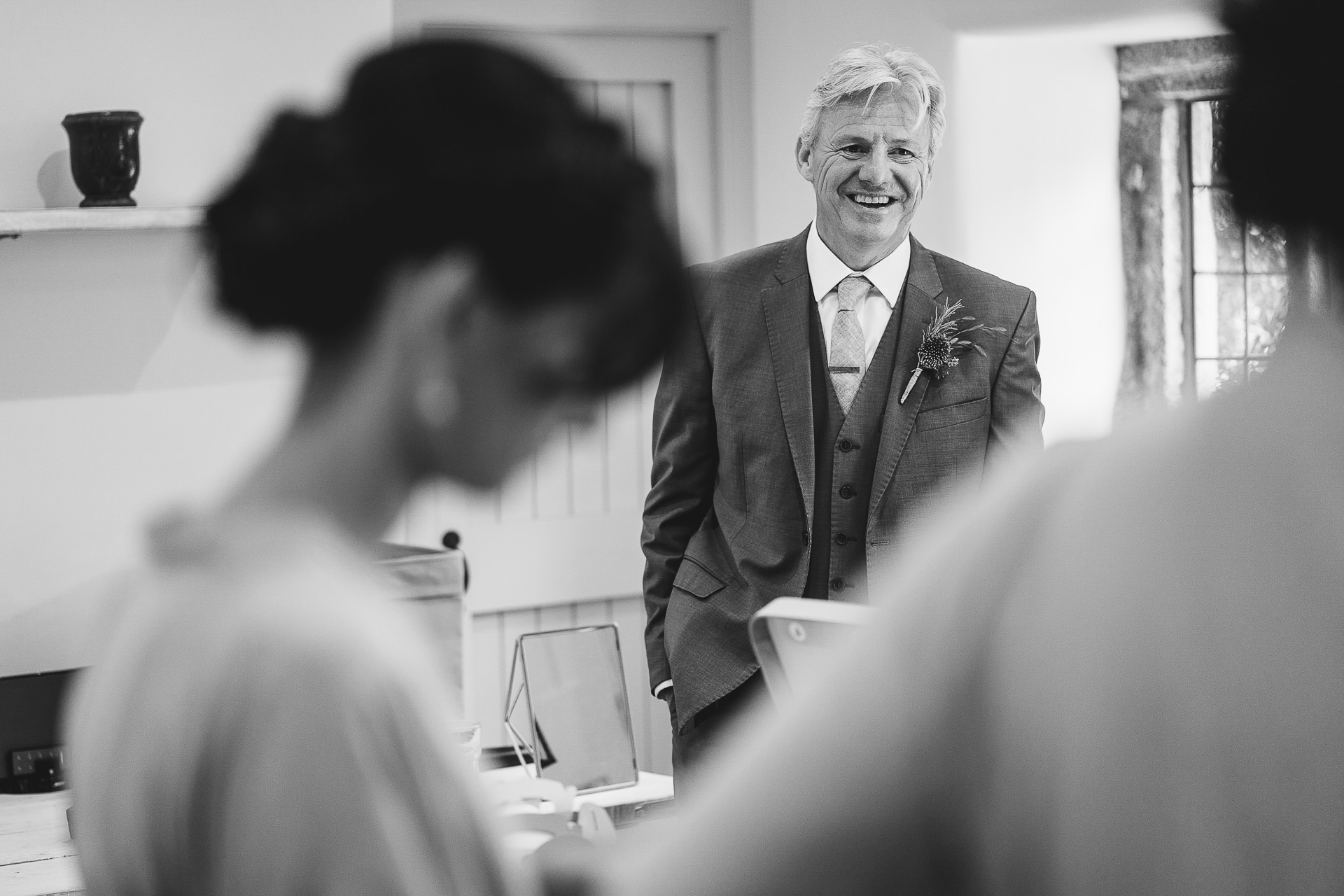Father of the bride smiling