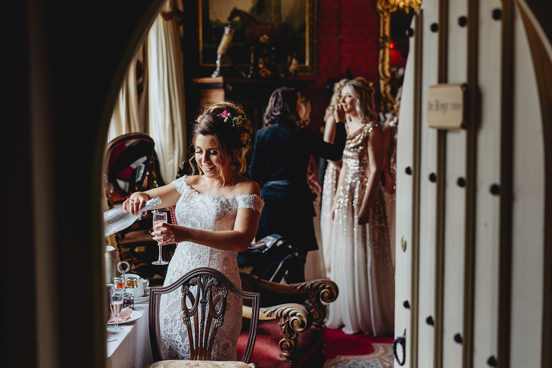 Bride pouring a glass of champagne