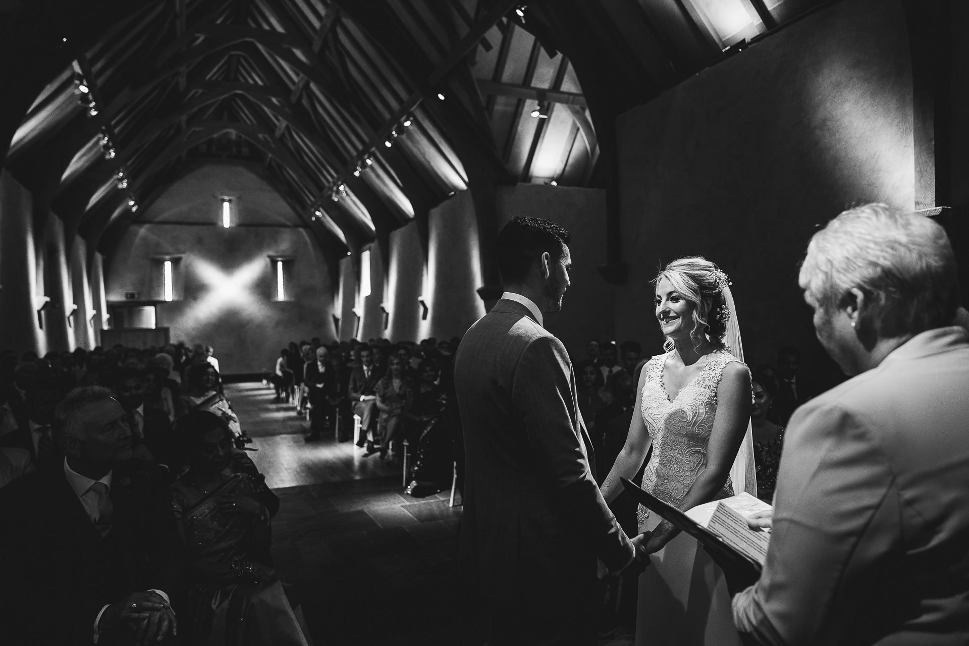 Bride and groom during ceremony at The Great Barn Devon