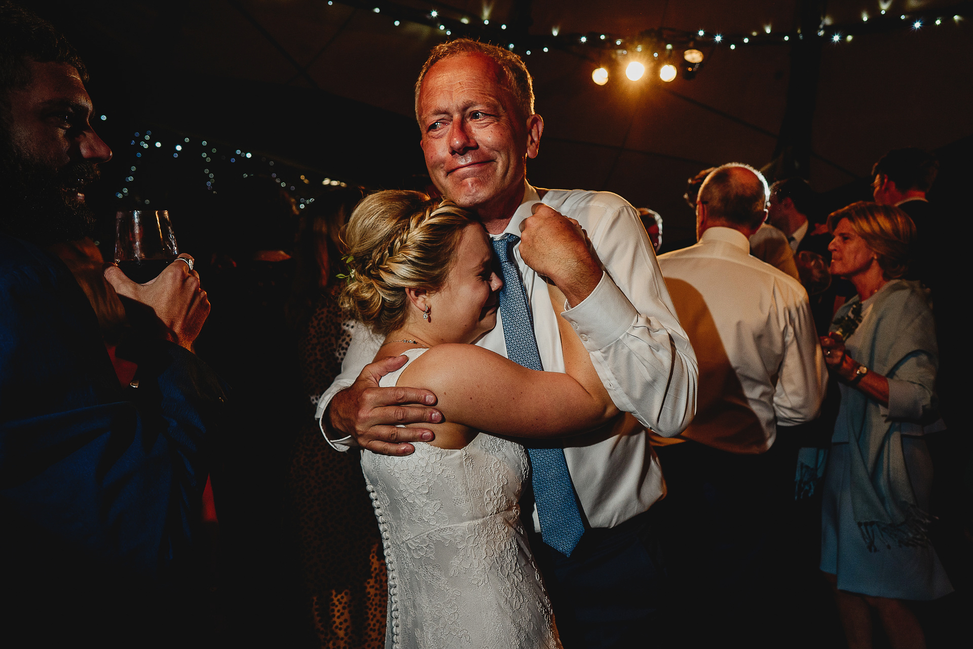 Bride and her father dancing together