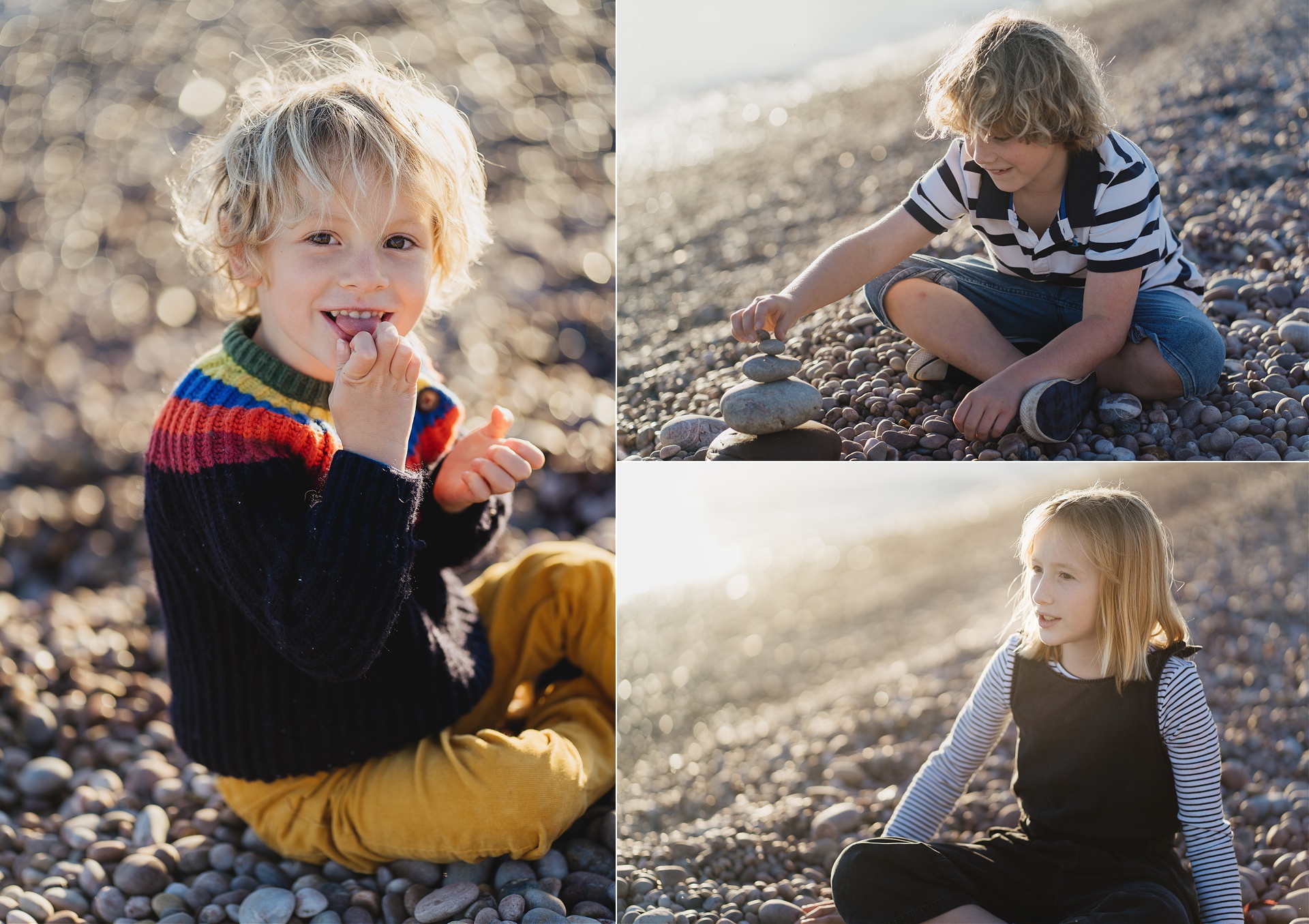 Three children sitting on a pebble beach in golden sunlight