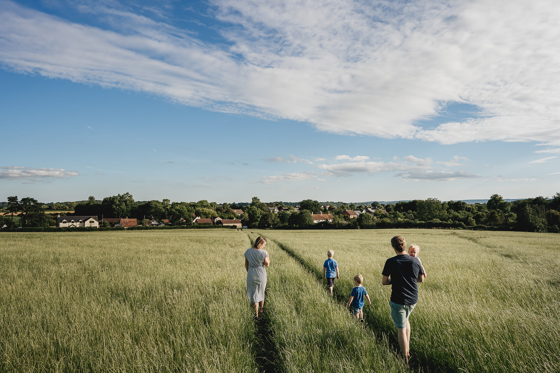 A family walking together through a field