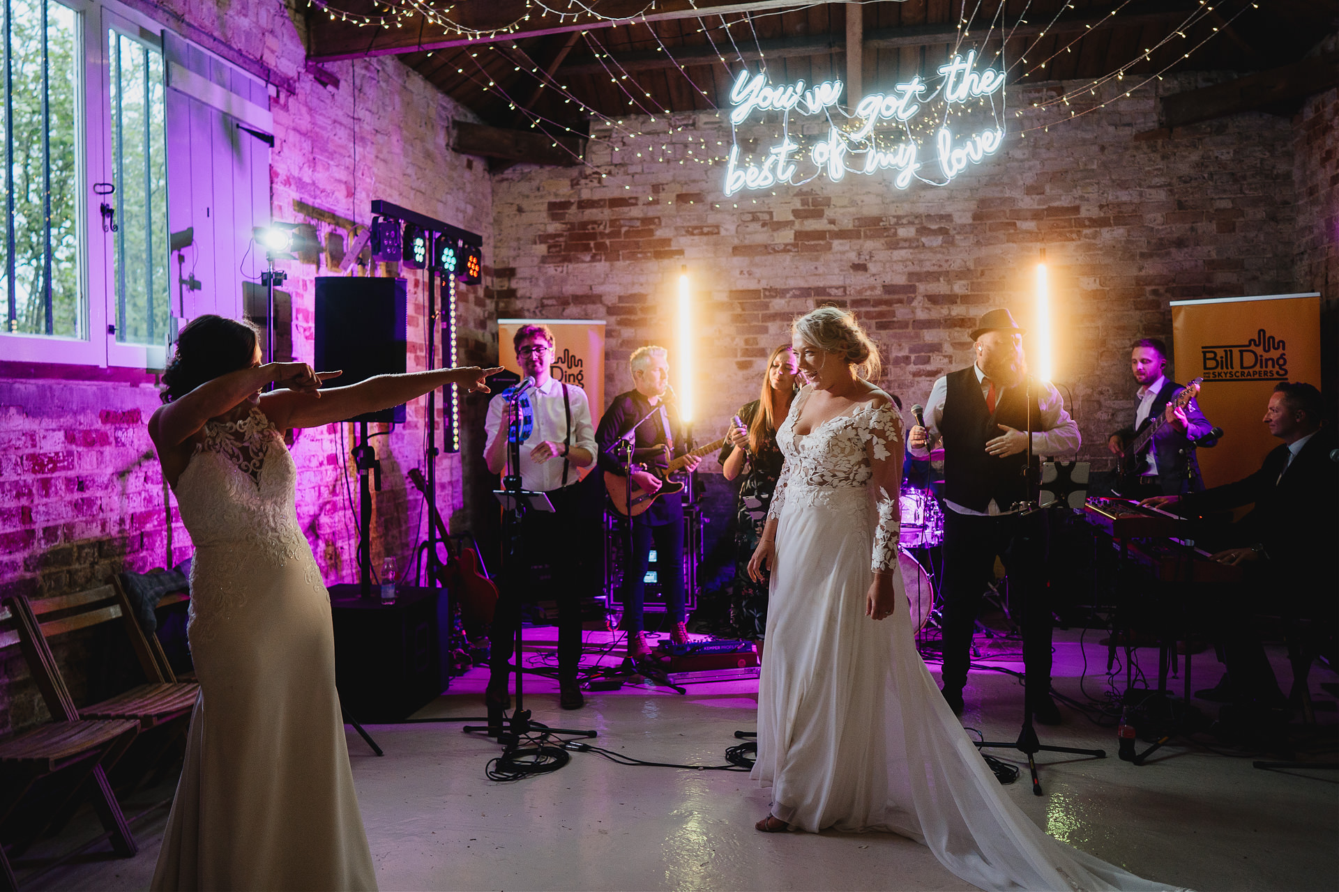 Two brides having their first dance at Cadhay Devon