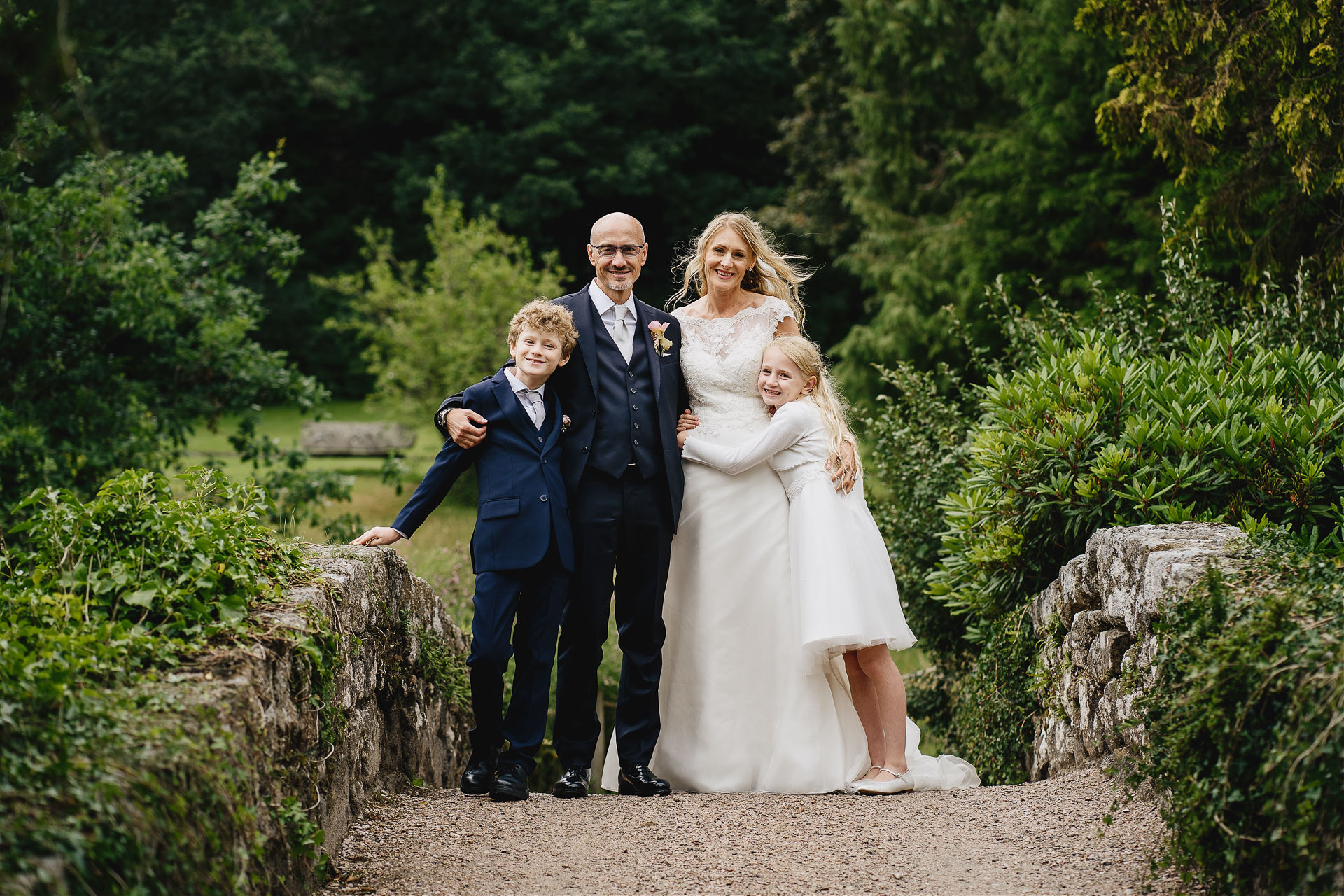 Bride and groom at Bovey Castle with their two children