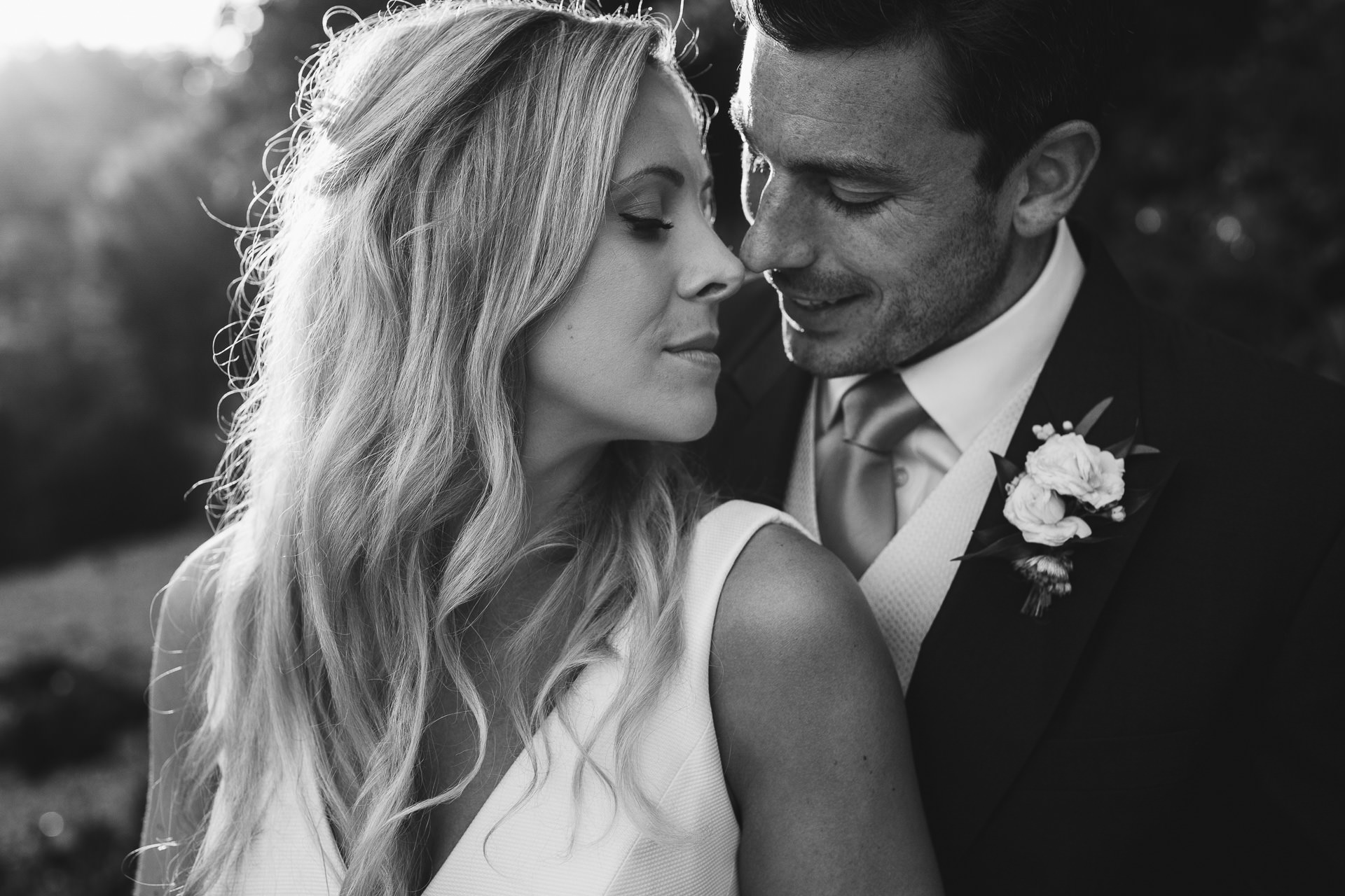 Close up black & white portrait of bride and groom