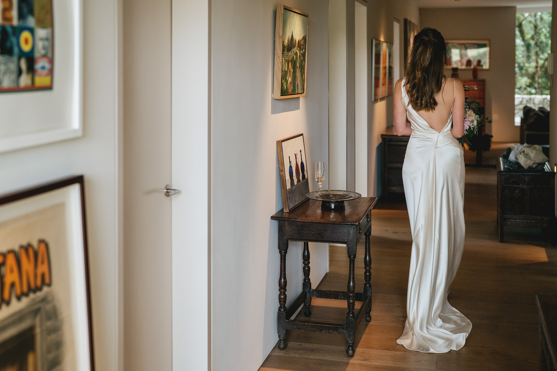 Bride wearing a backless Vivienne Westwood wedding gown