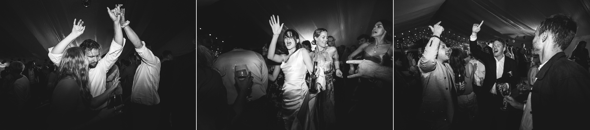 A stylish bride dancing with her wedding guests