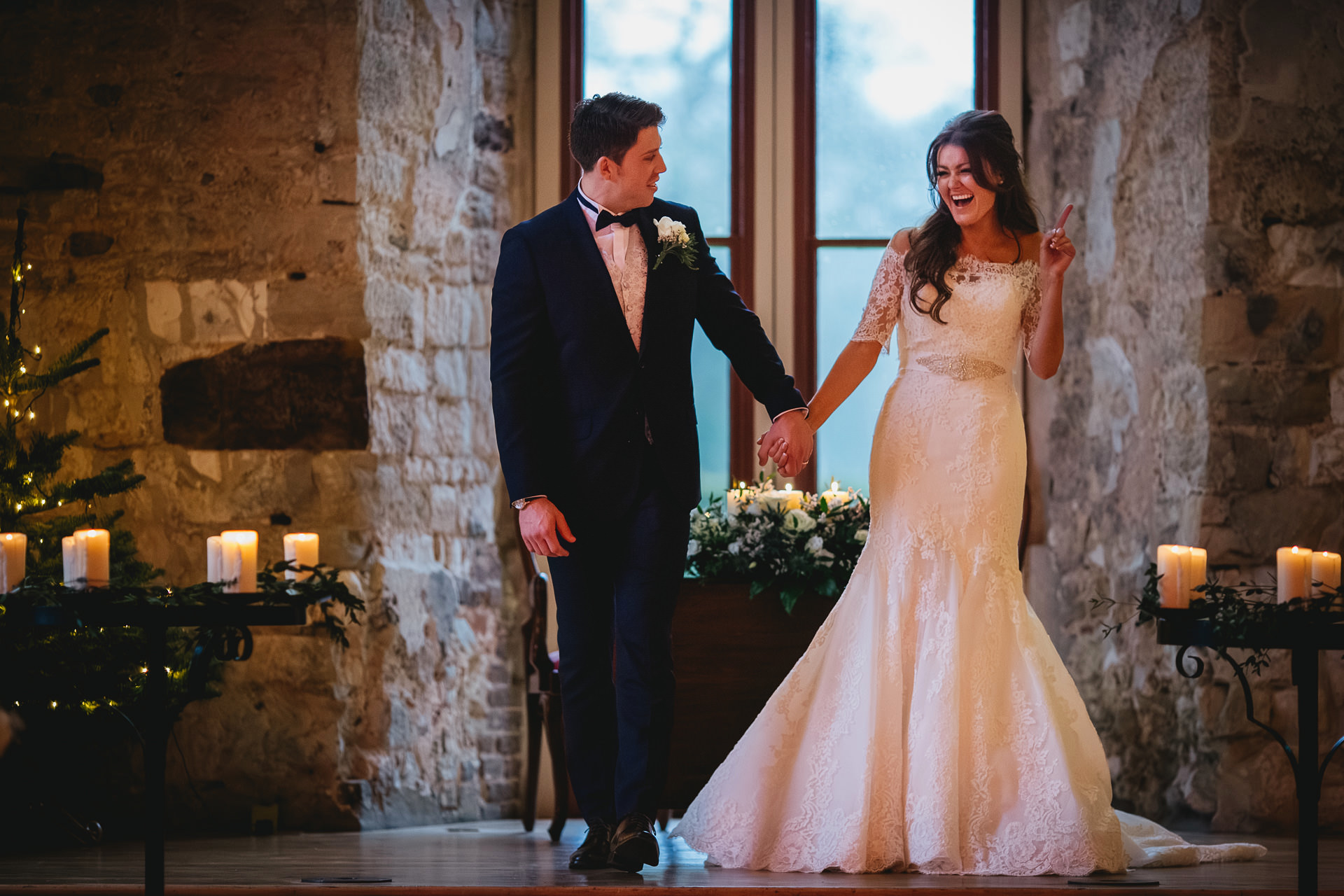 A bride and groom just married at a winter Lulworth Castle wedding in Dorset