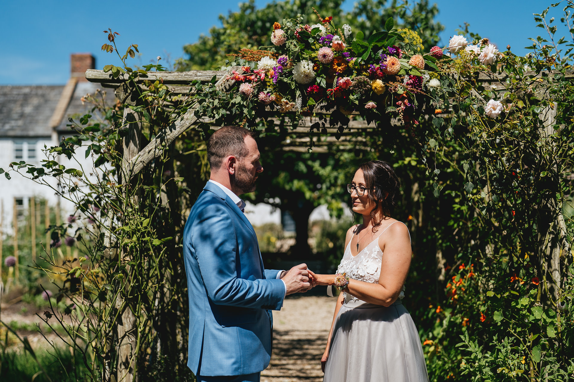 An elopement wedding ceremony in the kitchen garden at River Cottage