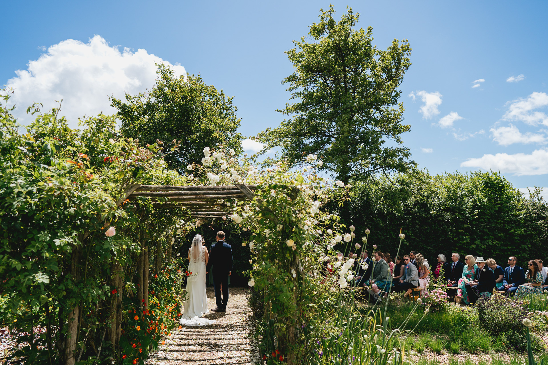 An outdoor wedding ceremony at River Cottage