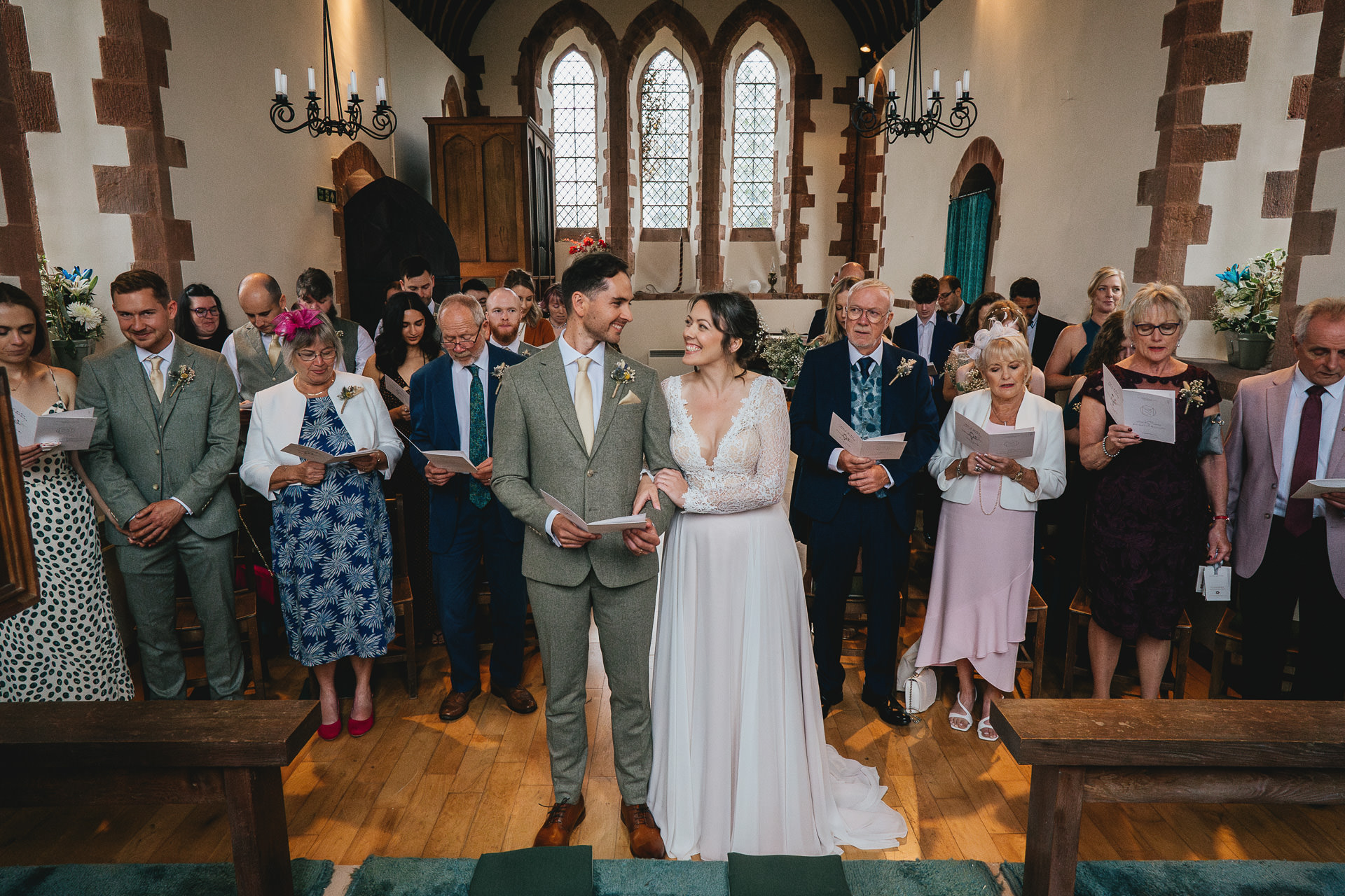 A small wedding ceremony at St Lawrence Chapel in Crediton, Devon