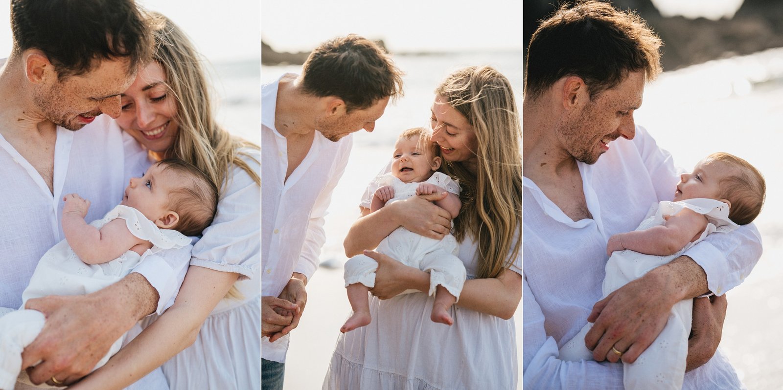 Parents cuddling a young baby during a photography session on the beach in North Devon